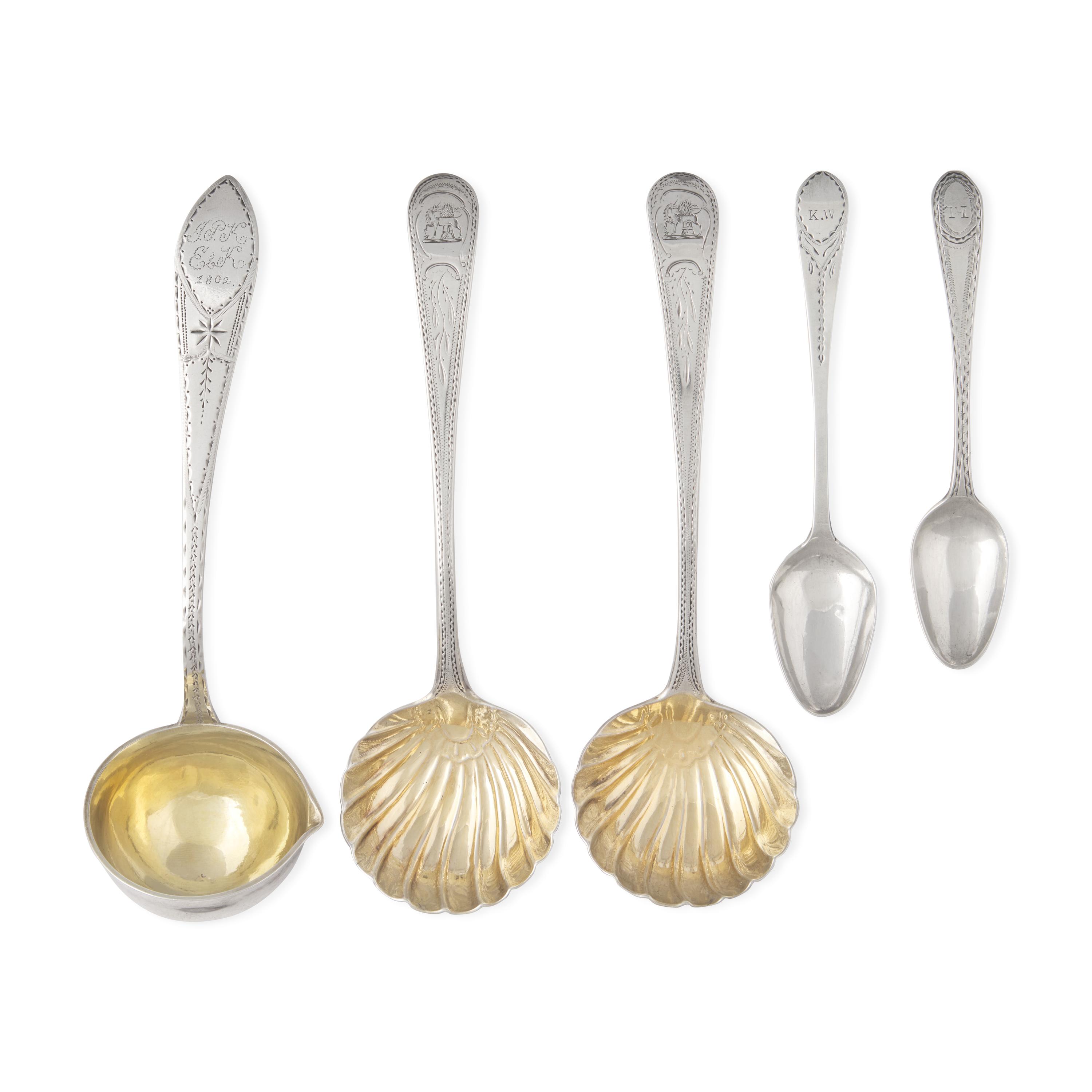 An Assorted Group of Five Silver Spoons and Sauce Ladles