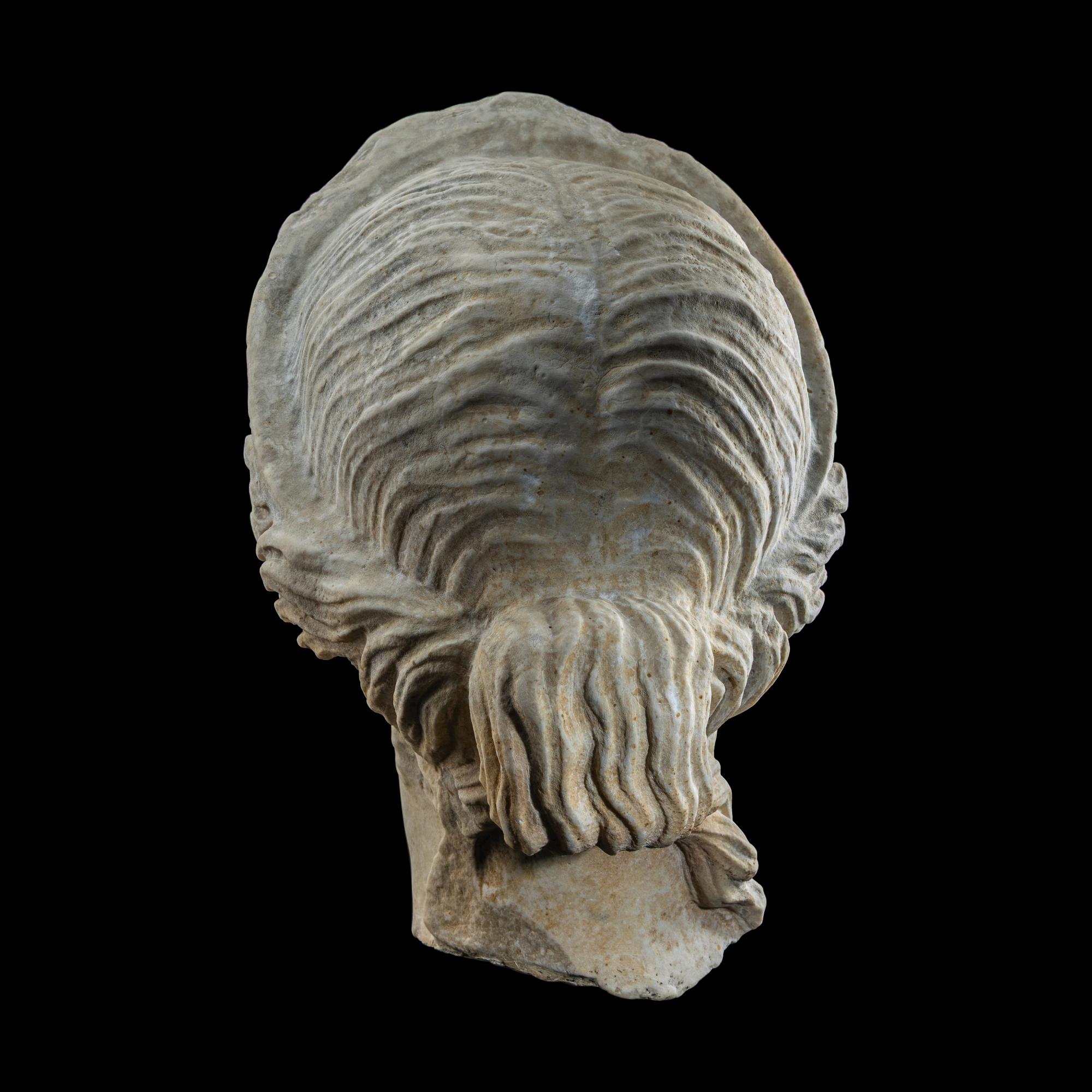 A Roman Marble Head of a Goddess