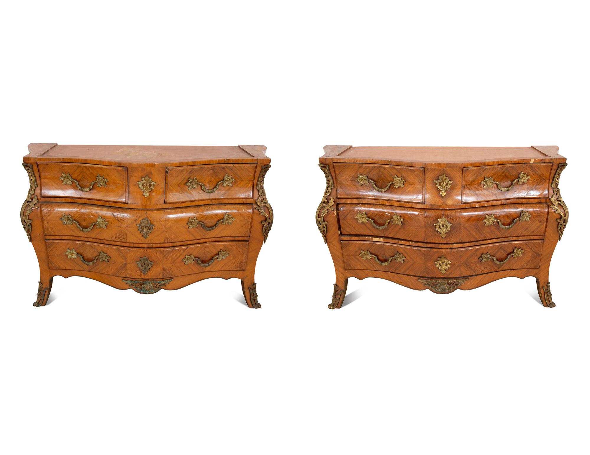 A Pair of Gilt Bronze Mounted Kingwood Bombe Commodes