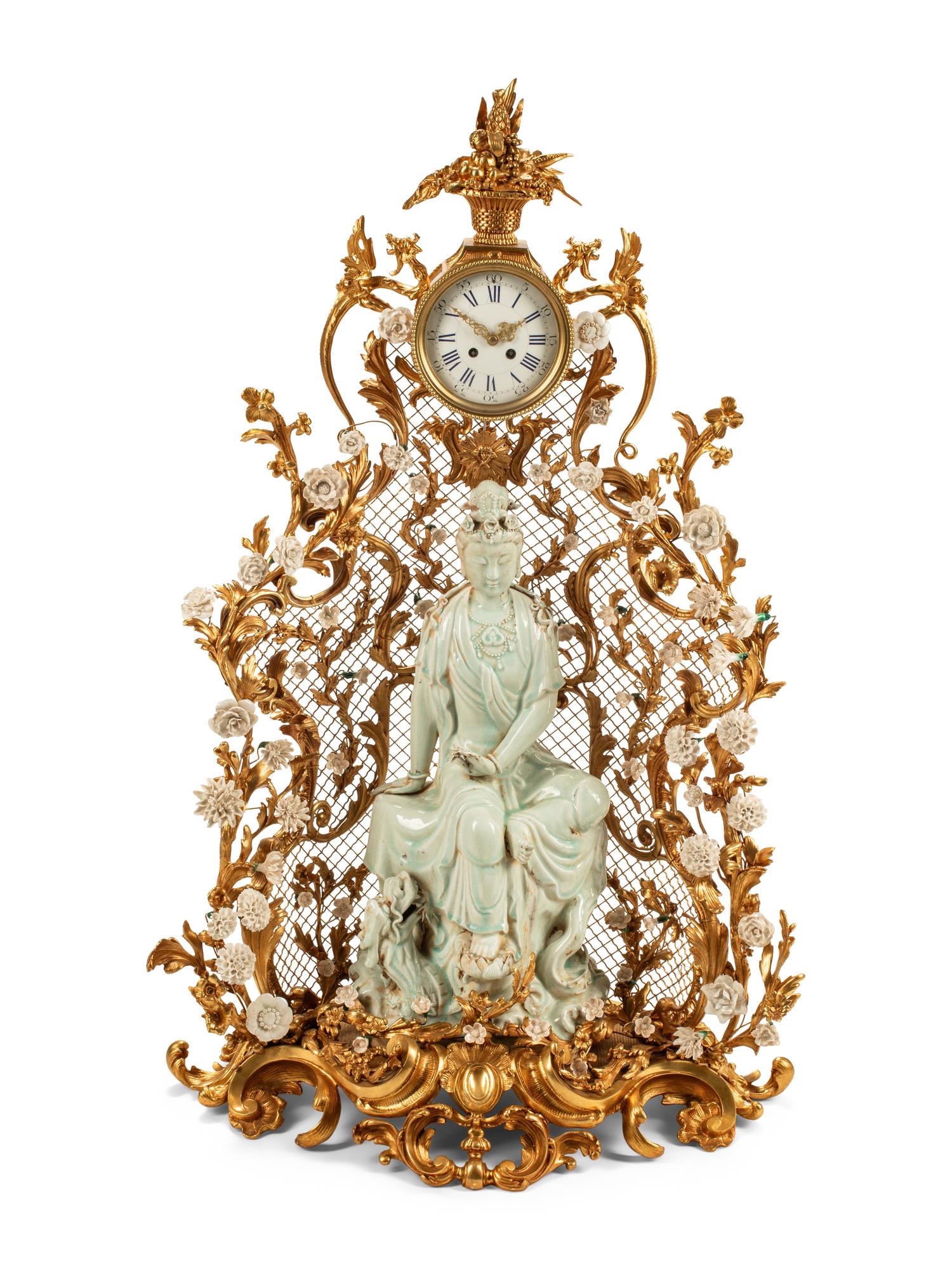 A Large Louis XV Style Gilt Bronze and White Porcelain Clock