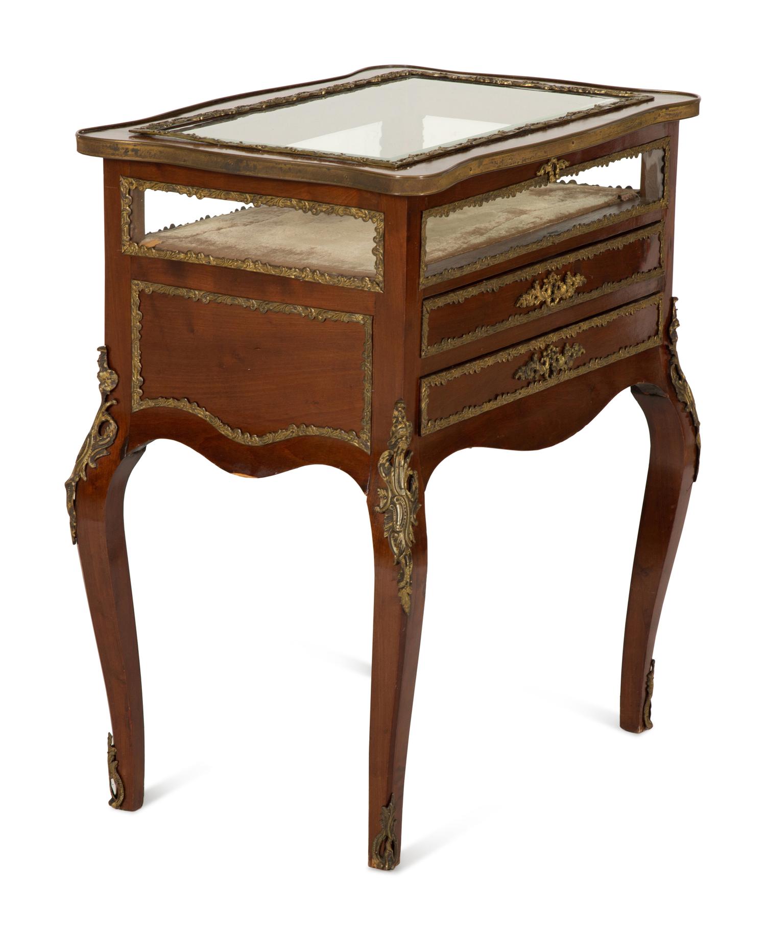A Louis XV Style Gilt Bronze Mounted Mahogany Vitrine Table
