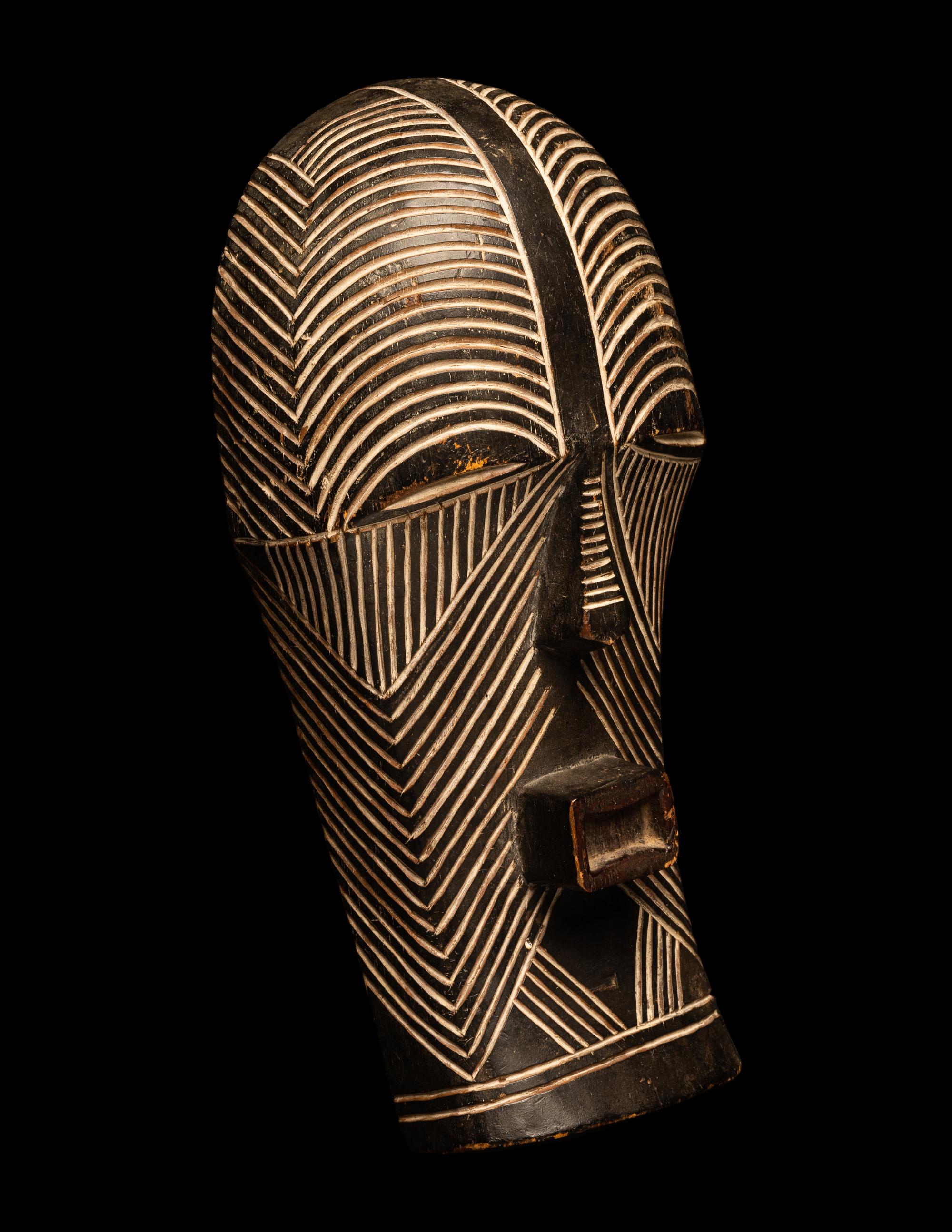 A Songye Wood Female Mask (Kifwebe)