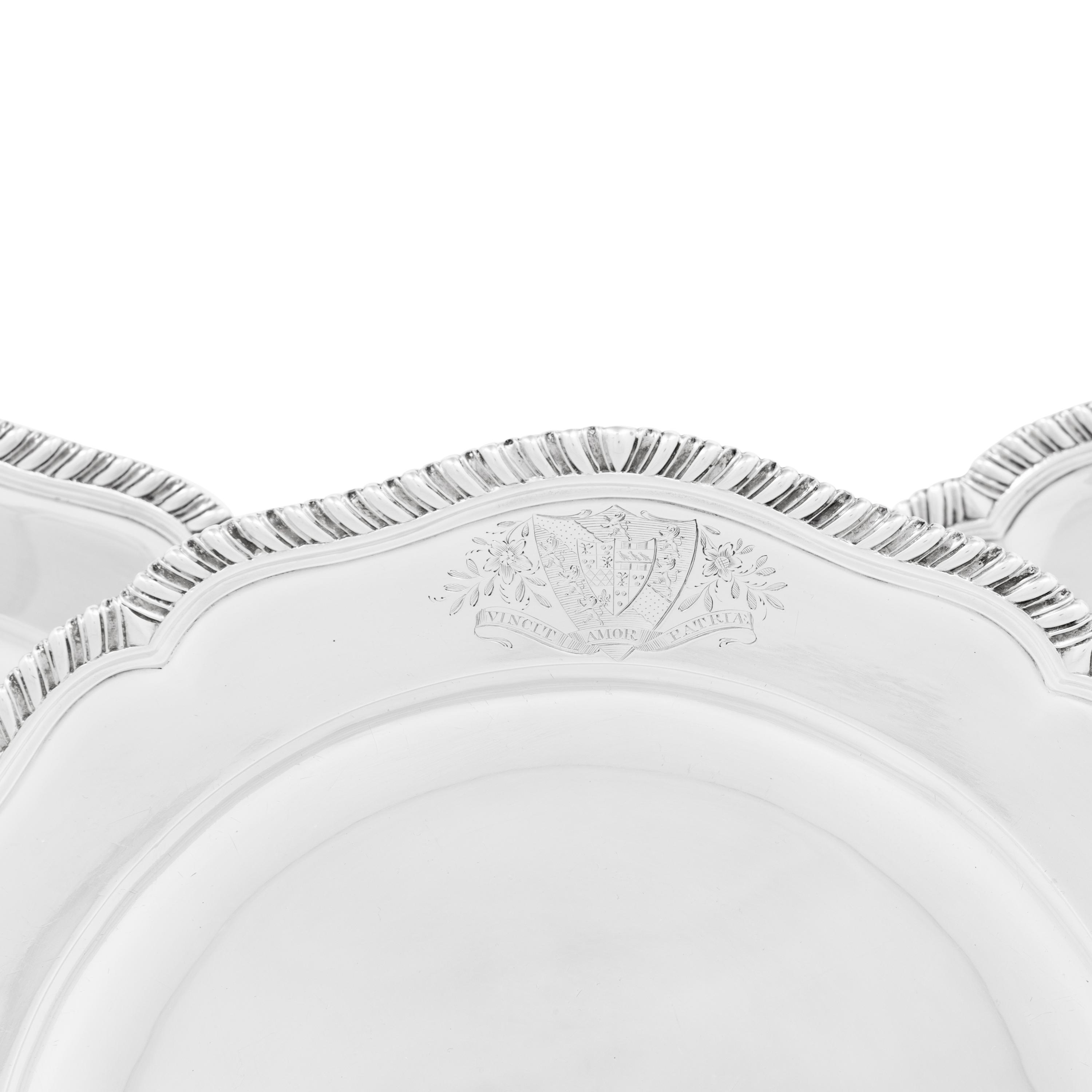A Group of Three George III Silver Dinner Plates