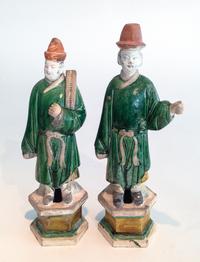 A Pair of Tang Style Partially Glazed Ceramic Figures Height of taller 15 3/4 inches.