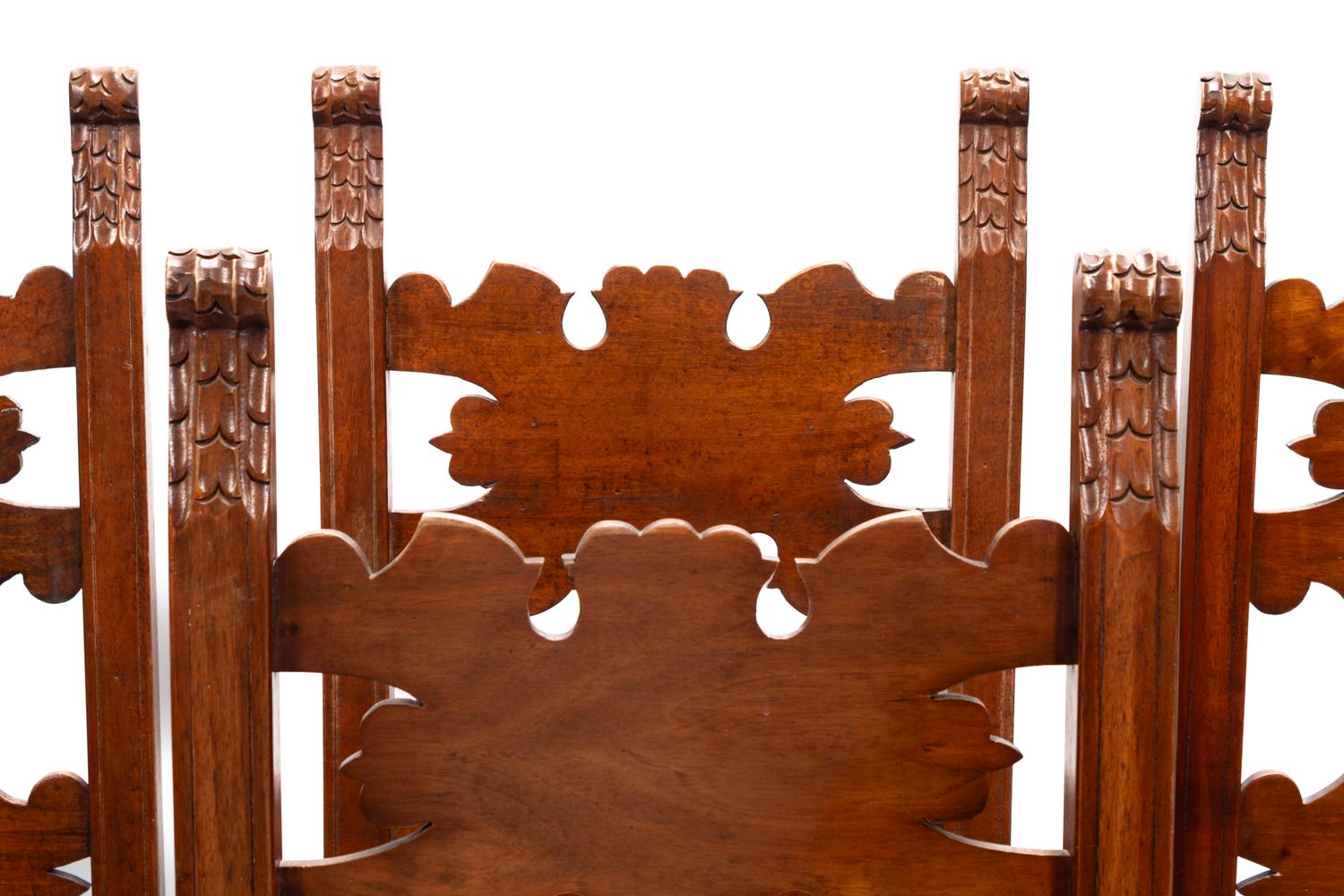 A Set of Eight Continental Baroque Style Walnut Chairs