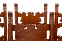 A Set of Eight Continental Baroque Style Walnut Chairs