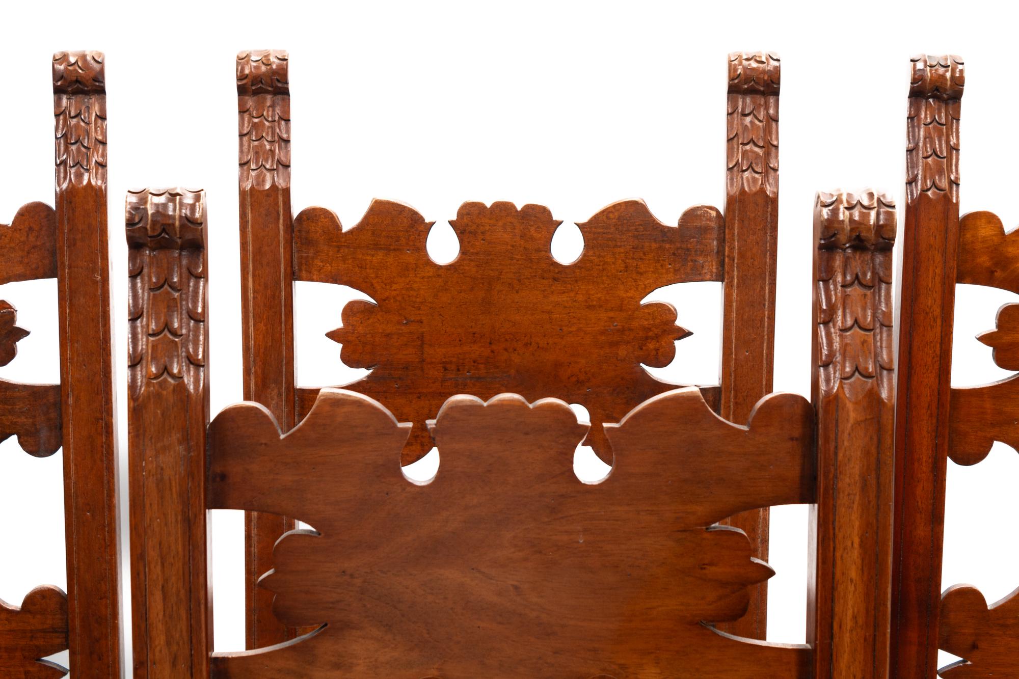 A Set of Eight Continental Baroque Style Walnut Chairs