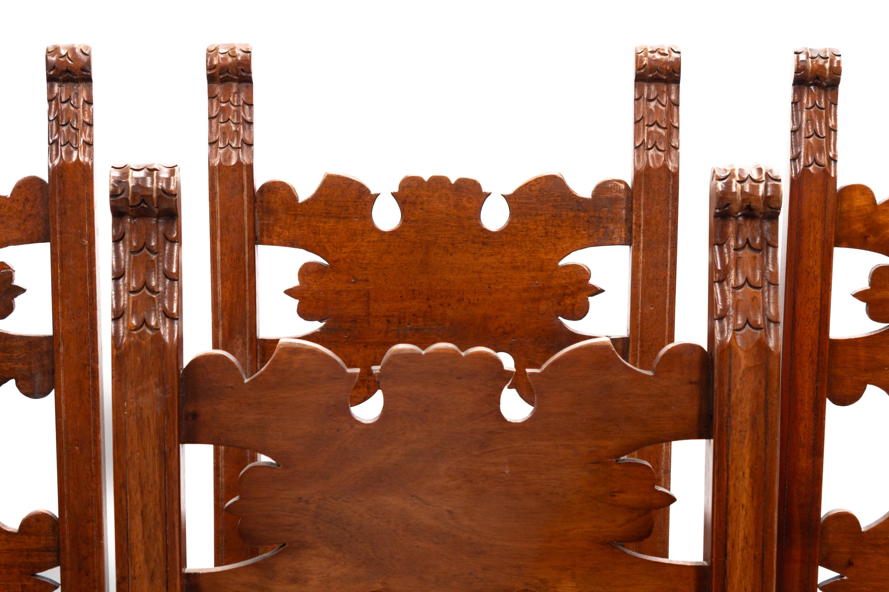 A Set of Eight Continental Baroque Style Walnut Chairs