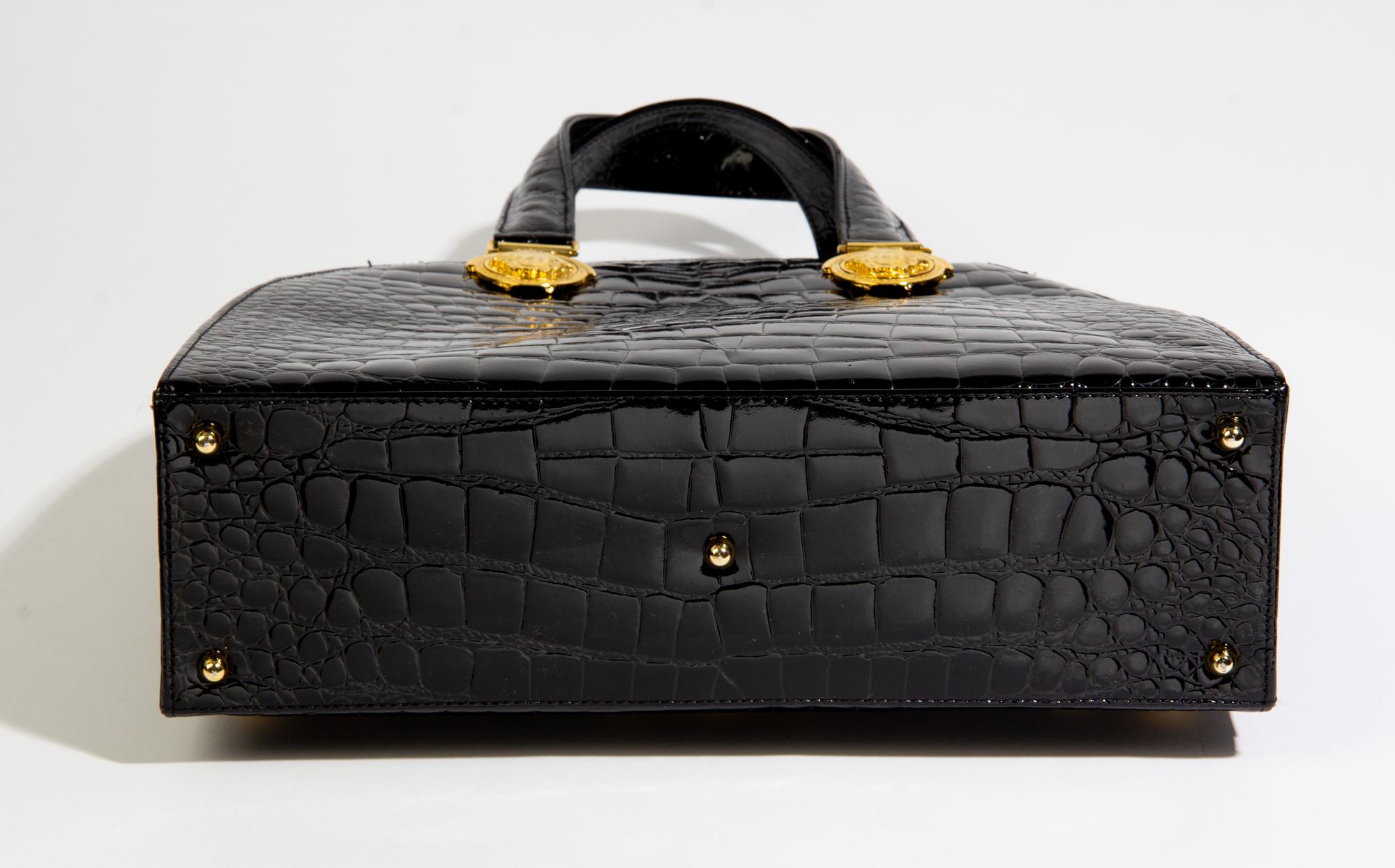 A Gianni Versace Black Patent Croc Embossed Medusa Bag, 11.5" x 10" x 3.75"; Handle drop: 5".
