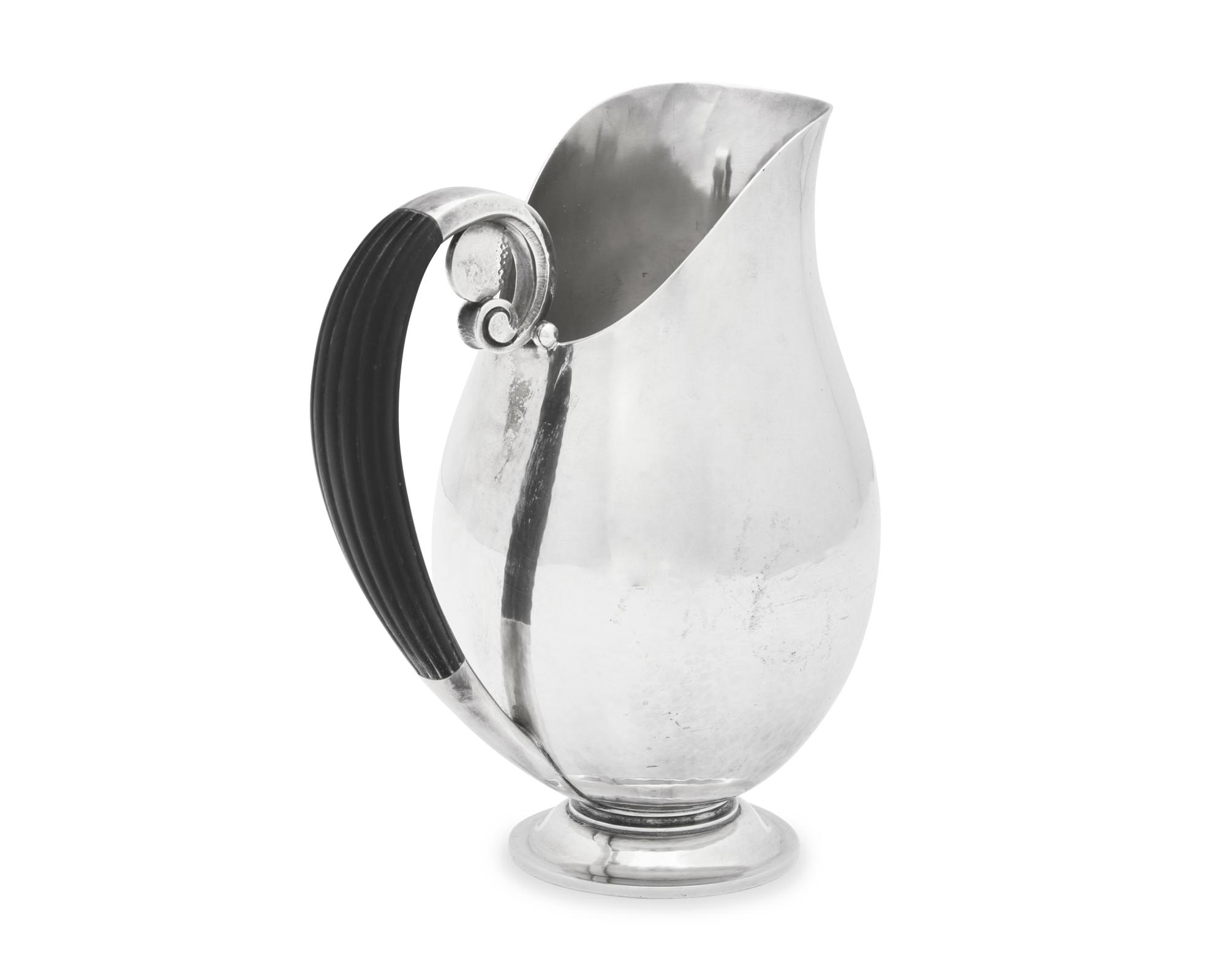 A Johan Rohde Designed Georg Jensen Silver Schilling Pitcher