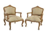 A Pair of French Provincial Fauteuils with Hide Upholstery — 20TH CENTURY