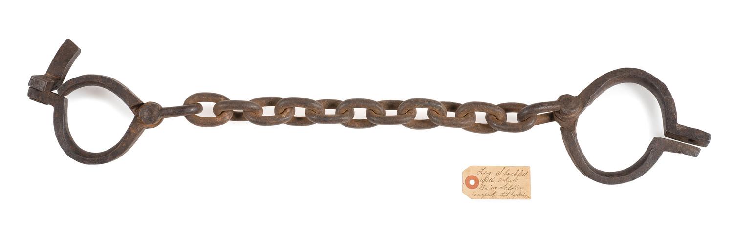 Libby Prison shackles worn by escaped Union soldier with vintage tag.