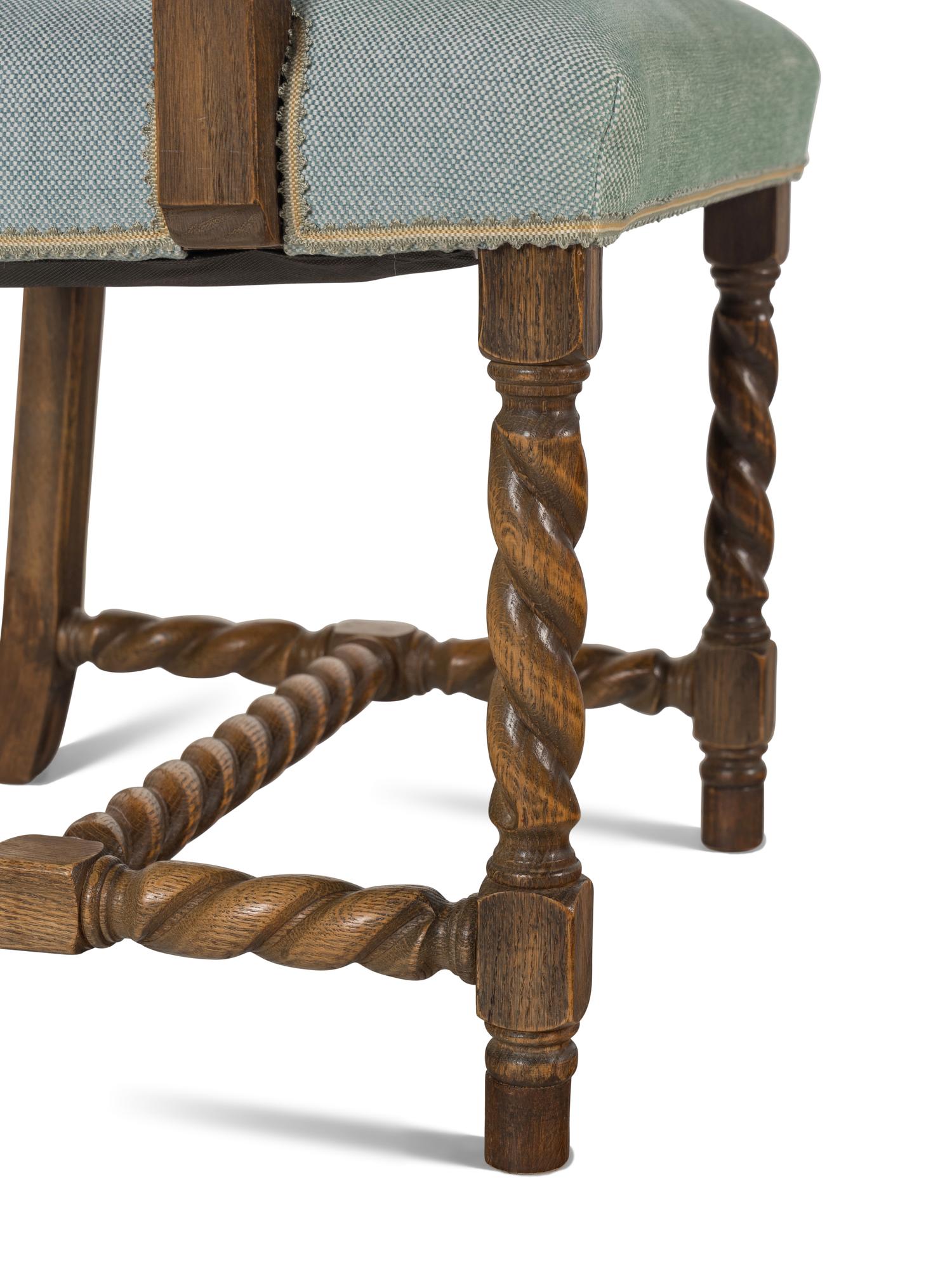 A Set of Six Jacobean Style Oak Dining Chairs