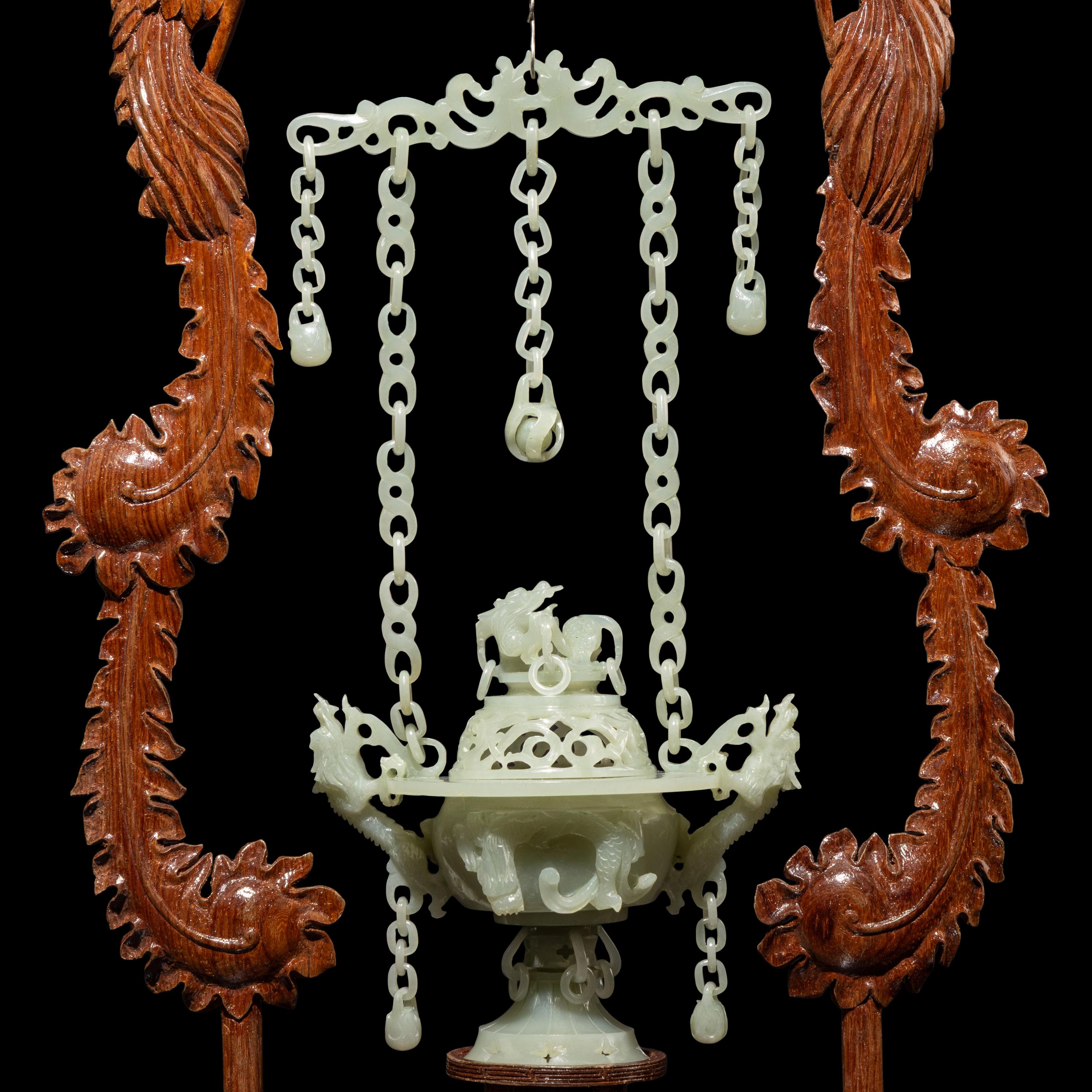 A Chinese Celadon Jade Hanging Incense Burner, 20th Century — 近代 青玉鏈式爐