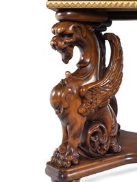 A Renaissance Revival Carved Walnut Library Table