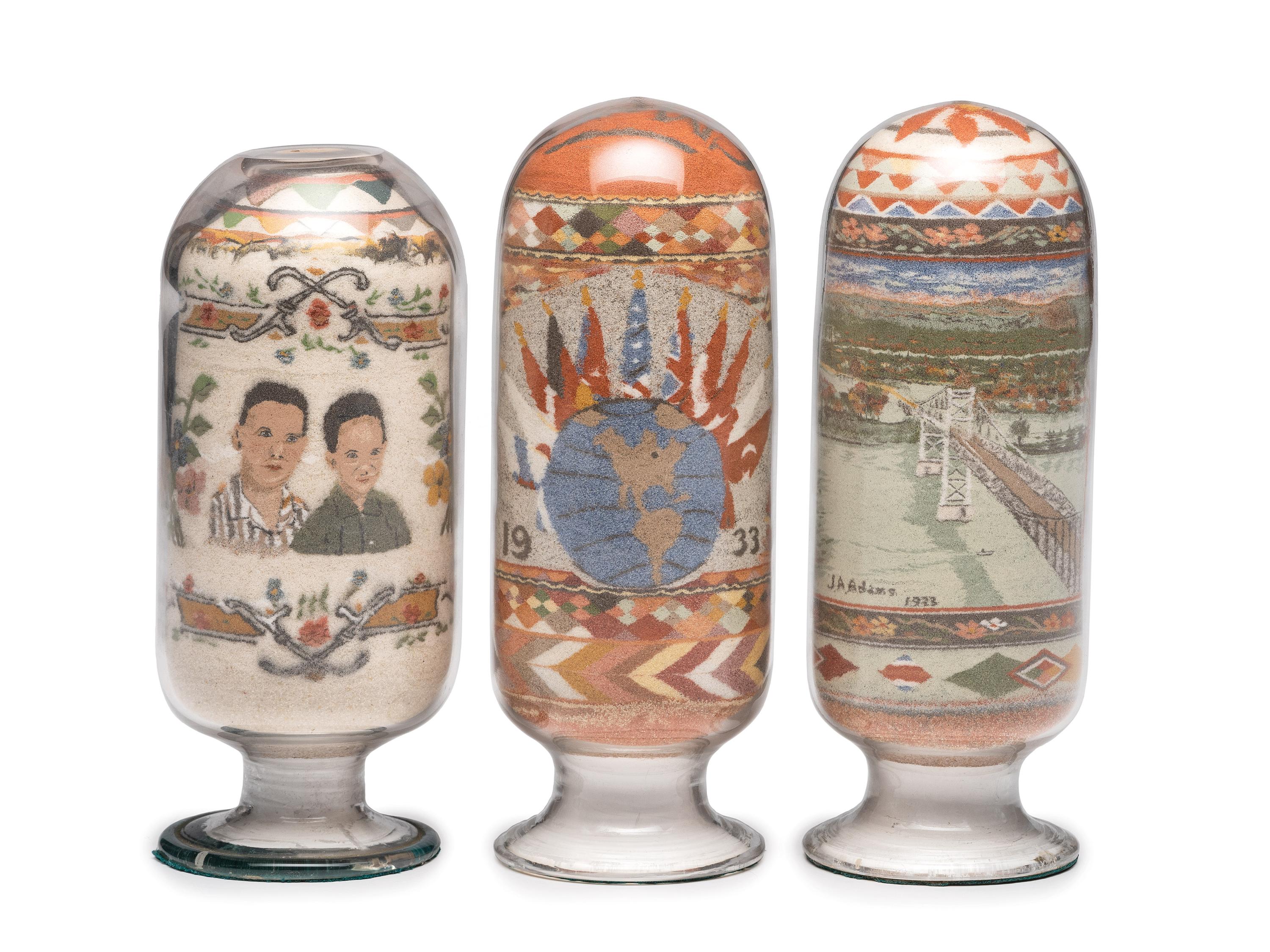 A Collection of John A. Adams Sand Art Bottles, Along with Custom Box and Unused Bottle