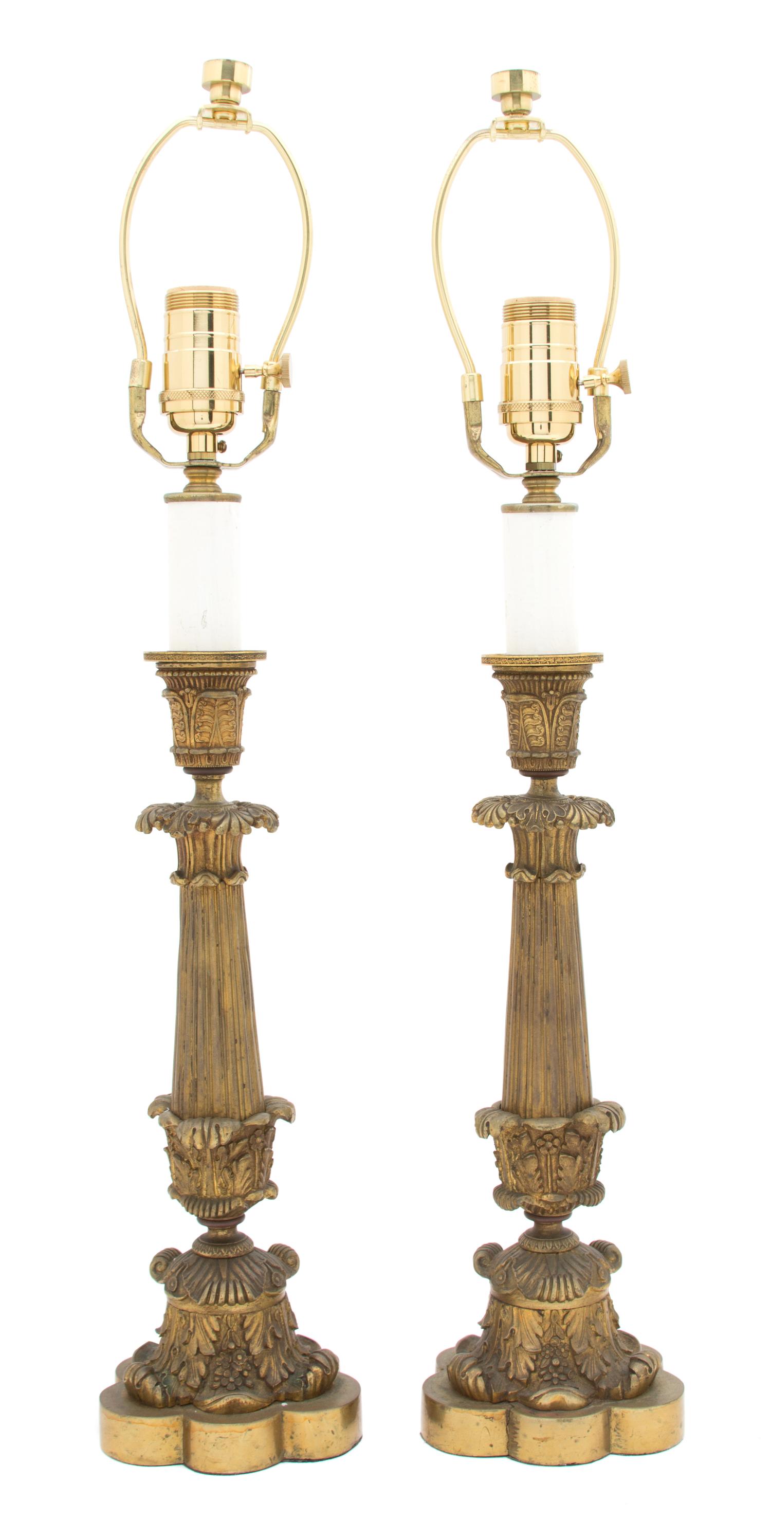 A Pair of Louis XV Style Patinated Gilt Bronze Candlesticks Height of candlestick 13 7/8 inches. — 19TH CENTURY