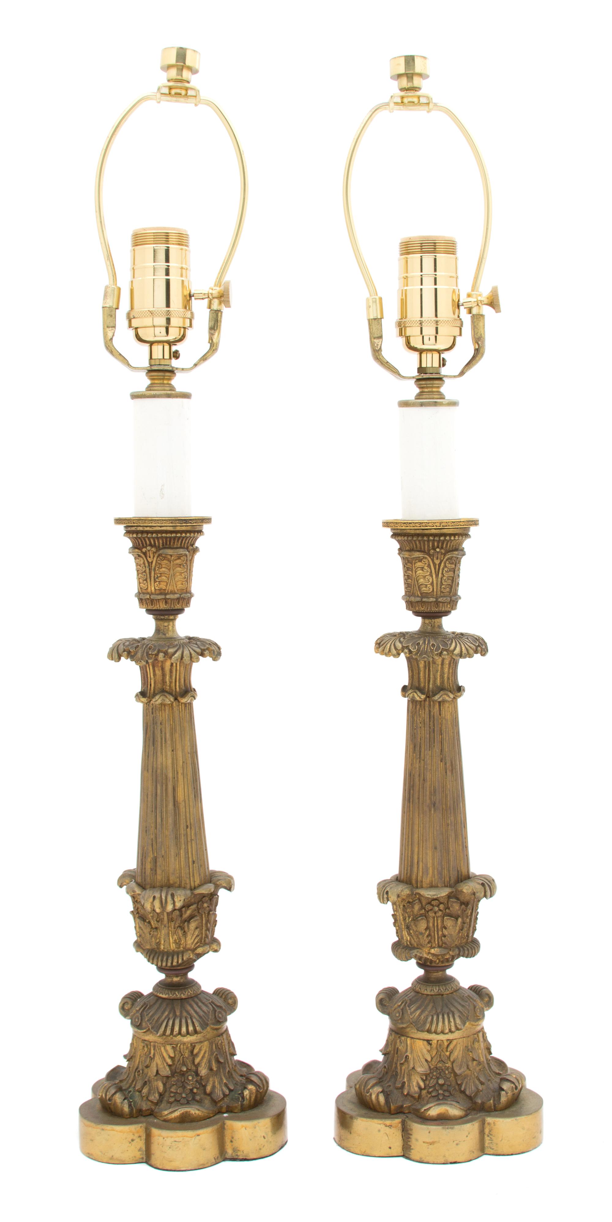 A Pair of Louis XV Style Patinated Gilt Bronze Candlesticks Height of candlestick 13 7/8 inches. — 19TH CENTURY