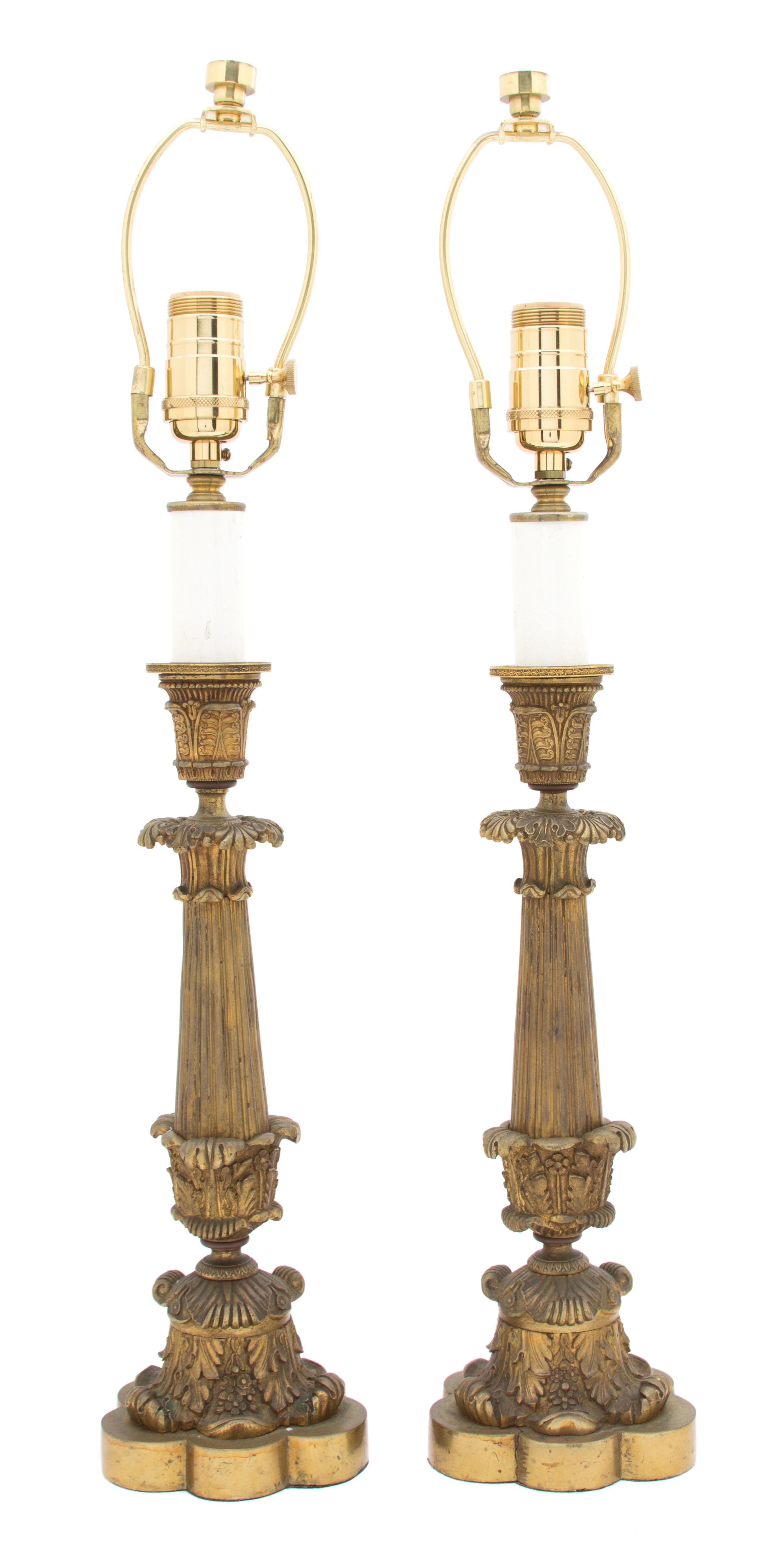 A Pair of Louis XV Style Patinated Gilt Bronze Candlesticks Height of candlestick 13 7/8 inches. — 19TH CENTURY