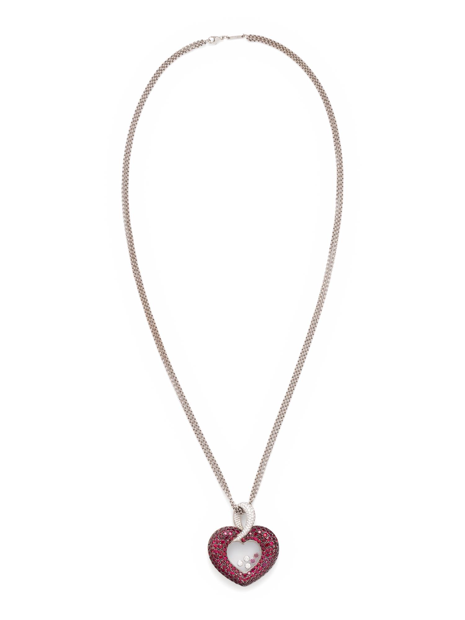 CHOPARD, RUBY AND DIAMOND 'HAPPY DIAMONDS' PENDANT/NECKLACE