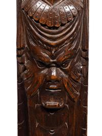 A Pair of Continental Carved Figural Pilasters