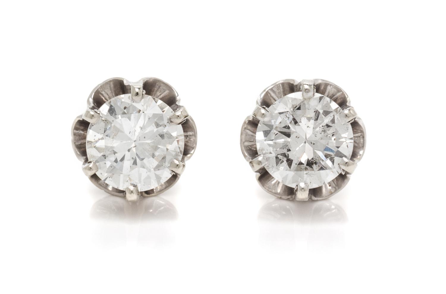 A Pair of White Gold and Diamond Stud Earrings, 1.70 dwts.