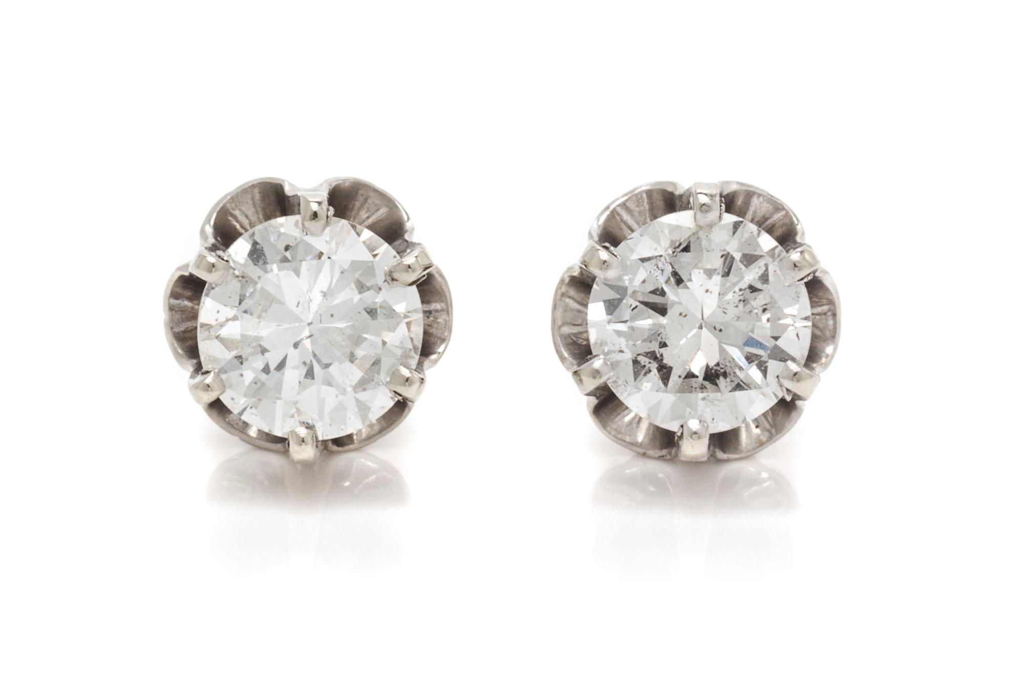 A Pair of White Gold and Diamond Stud Earrings, 1.70 dwts.