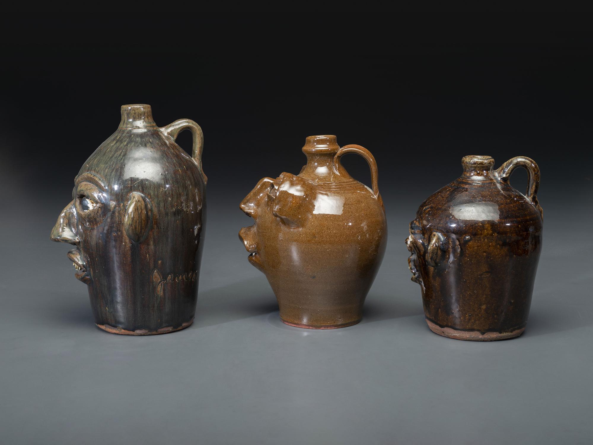 Three Southern Stoneware Face Jugs