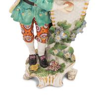 A Pair of Chelsea Porcelain Figures