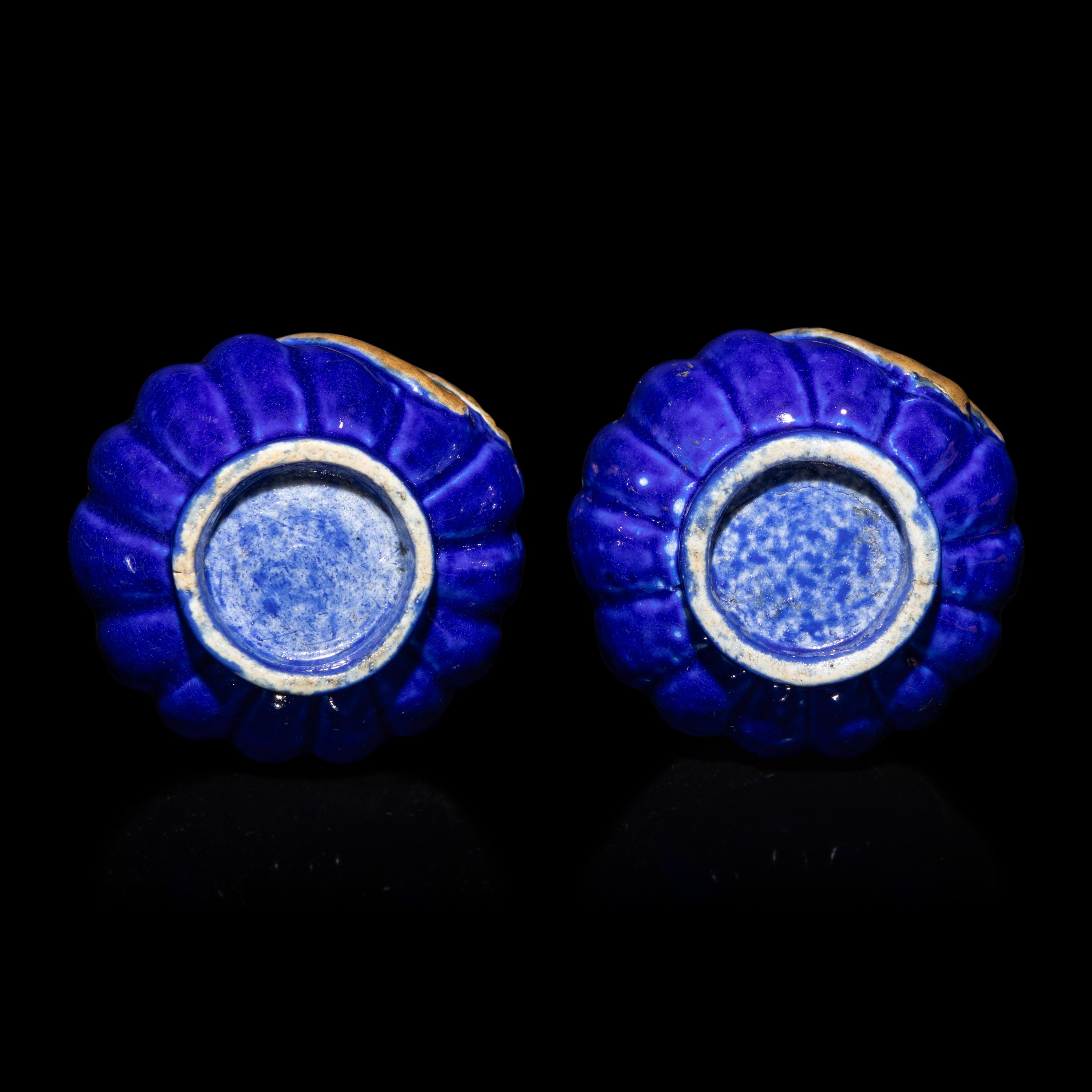 A Pair of Chinese Gilt Decorated Blue Glazed Porcelain Gourd Vases, 20th Century — 霽藍釉描金葫蘆式包袱瓶一對