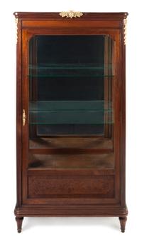 A Louis XVI Style Gilt Bronze Mounted Mahogany Vitrine, Height 70 1/4 x width 38 x depth 16 1/2 inches.
