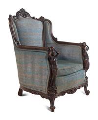 A Pair of Carved Walnut Armchairs in the Style of Karpen Bros.