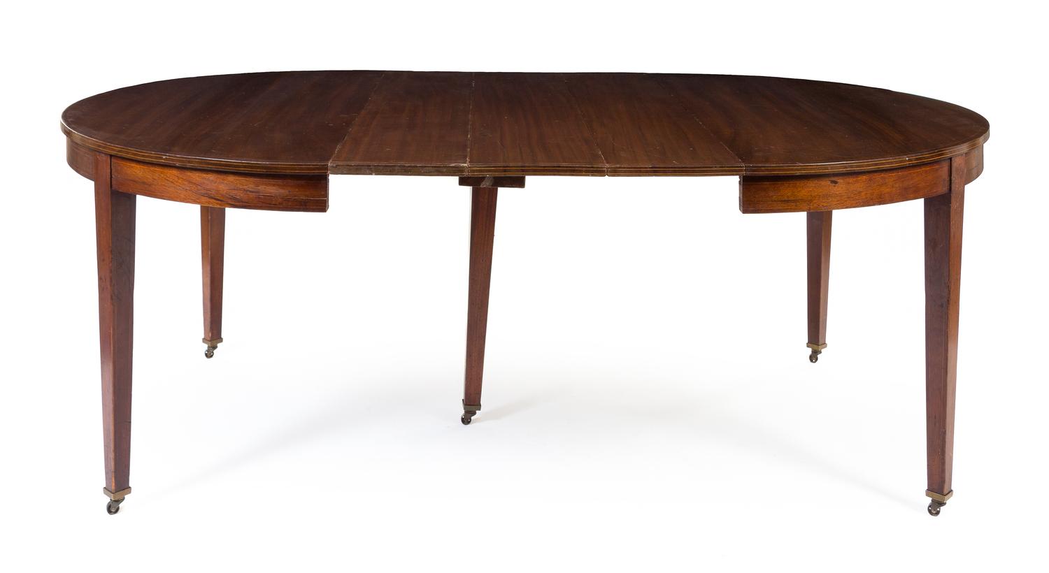 A Hepplewhite Mahogany Dining Table Height 30 1/2 x diameter 54 inches. — 19TH CENTURY