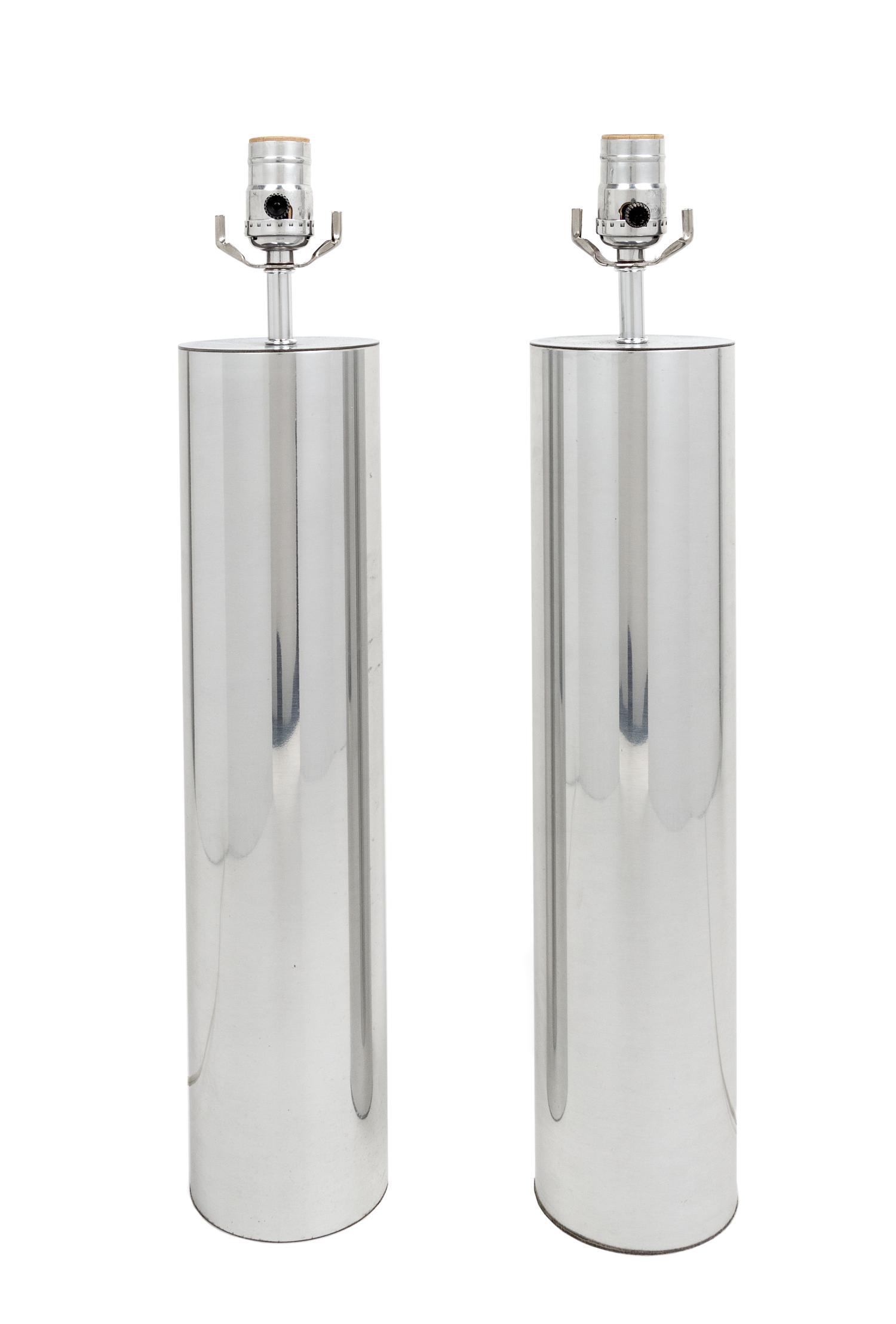 A Pair of Chrome Table Lamps Height of base 17 inches.