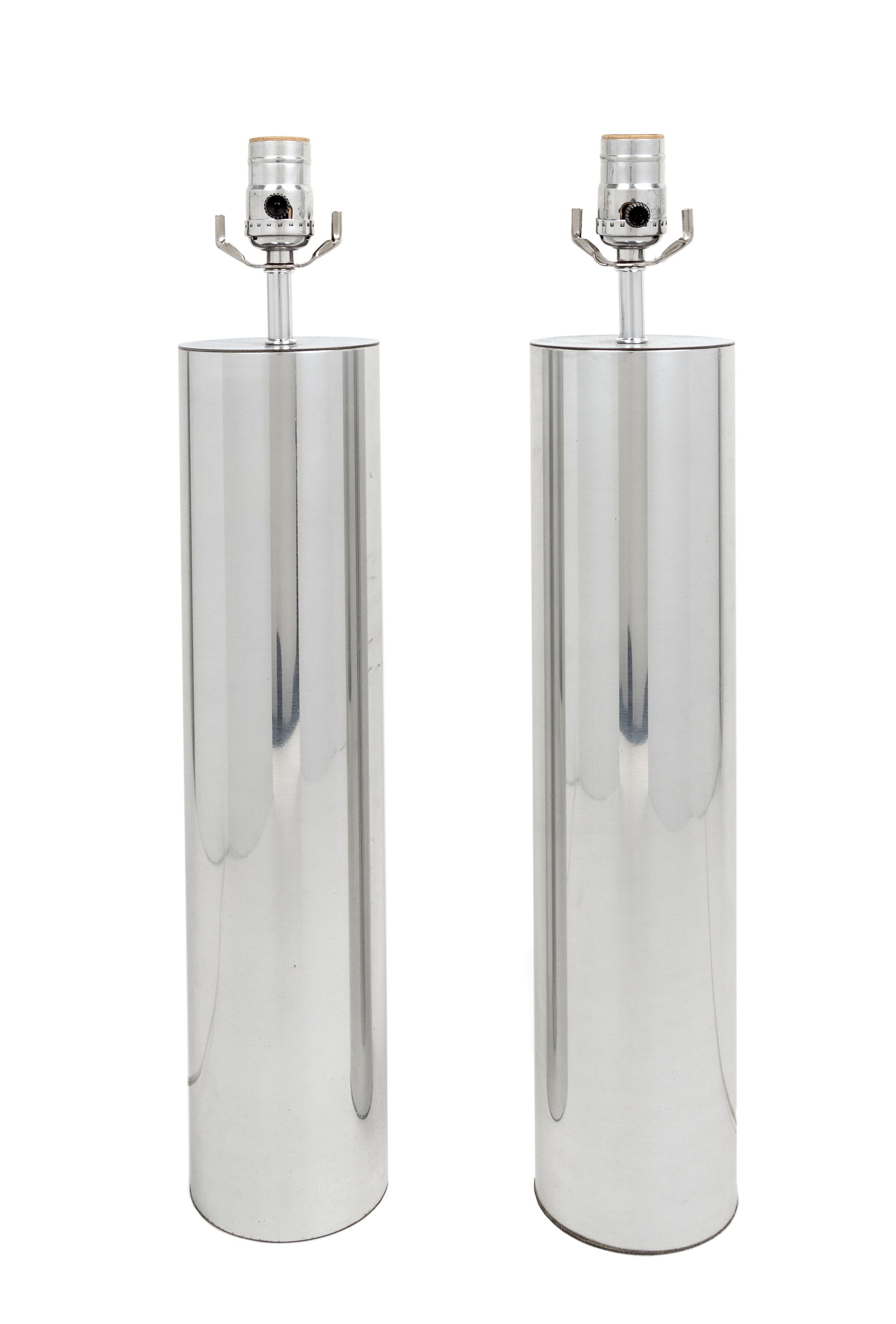 A Pair of Chrome Table Lamps Height of base 17 inches.