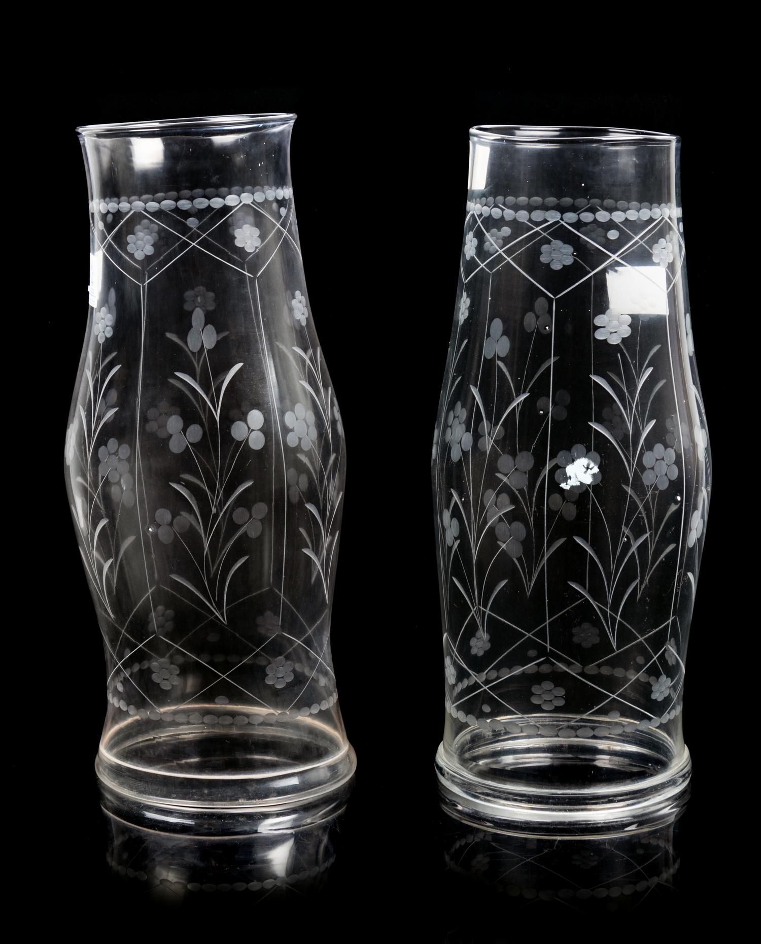 A Pair of Etched Glass Hurricane Candles