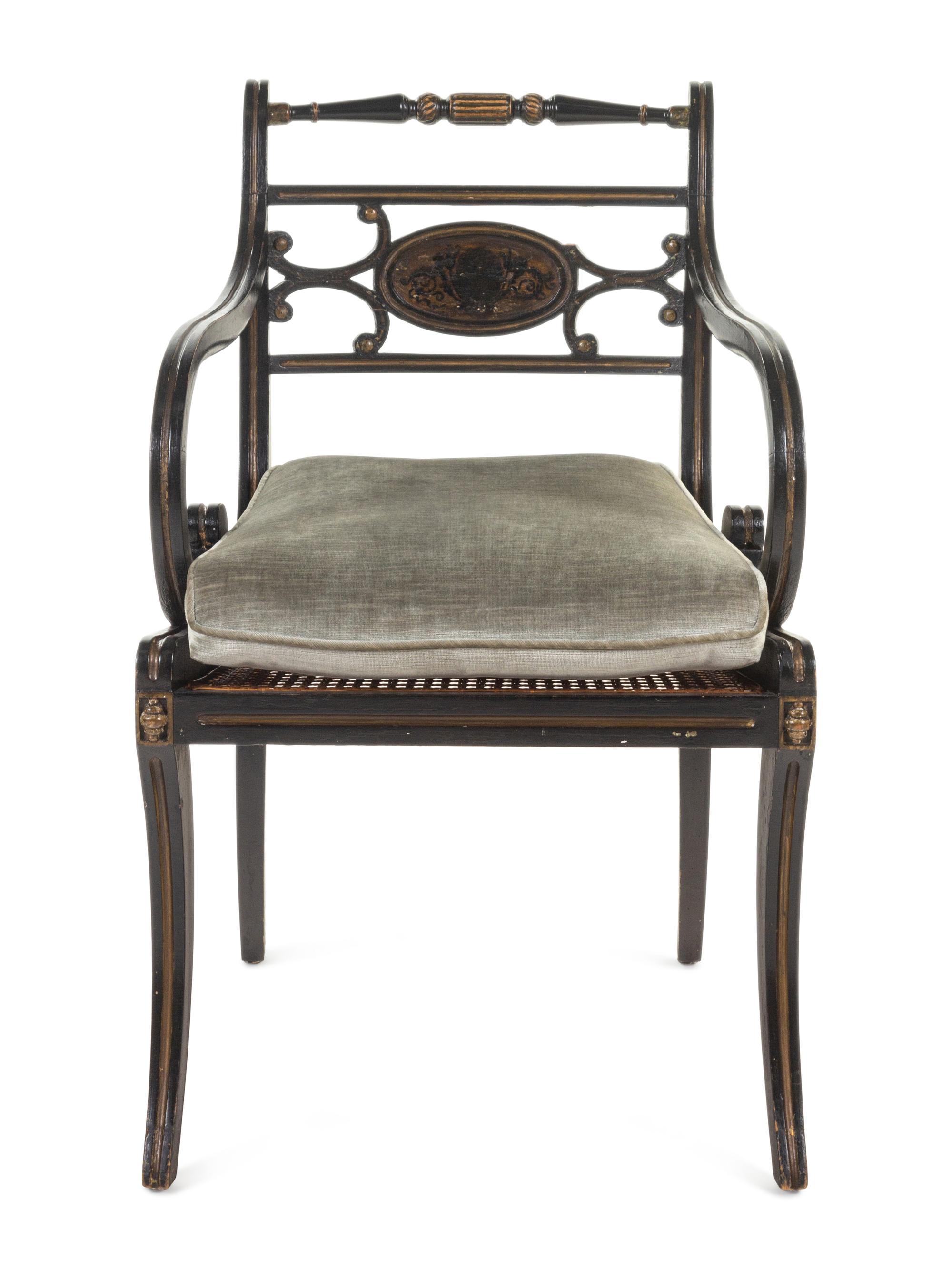 A Regency Painted and Parcel-Gilt Cane Seat Armchair