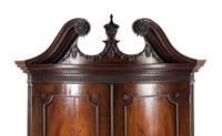 A George III Mahogany Serpentine Bookcase
