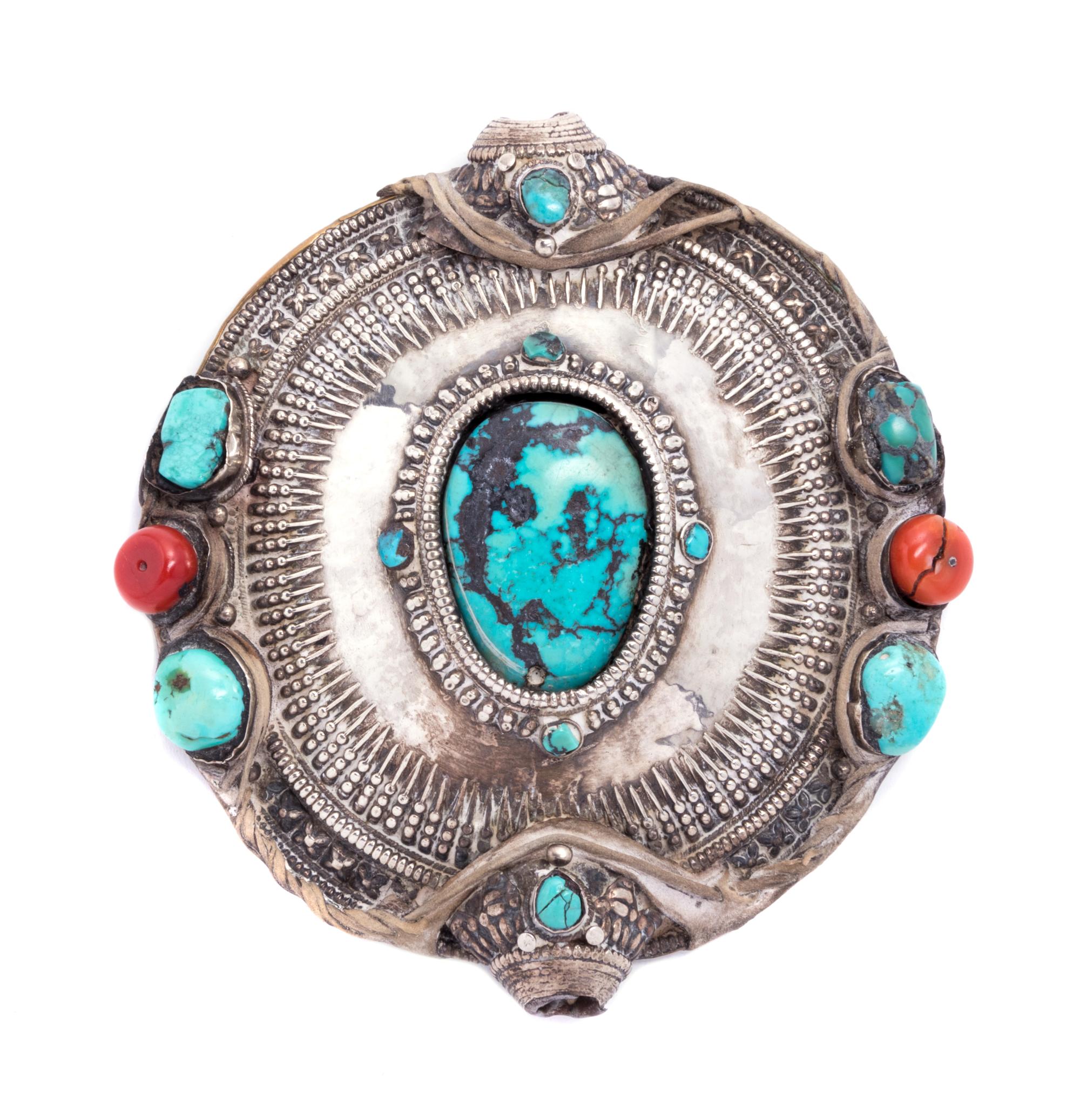 A Tibetan Turquois Inset Silver Medallion Height 4 inches.