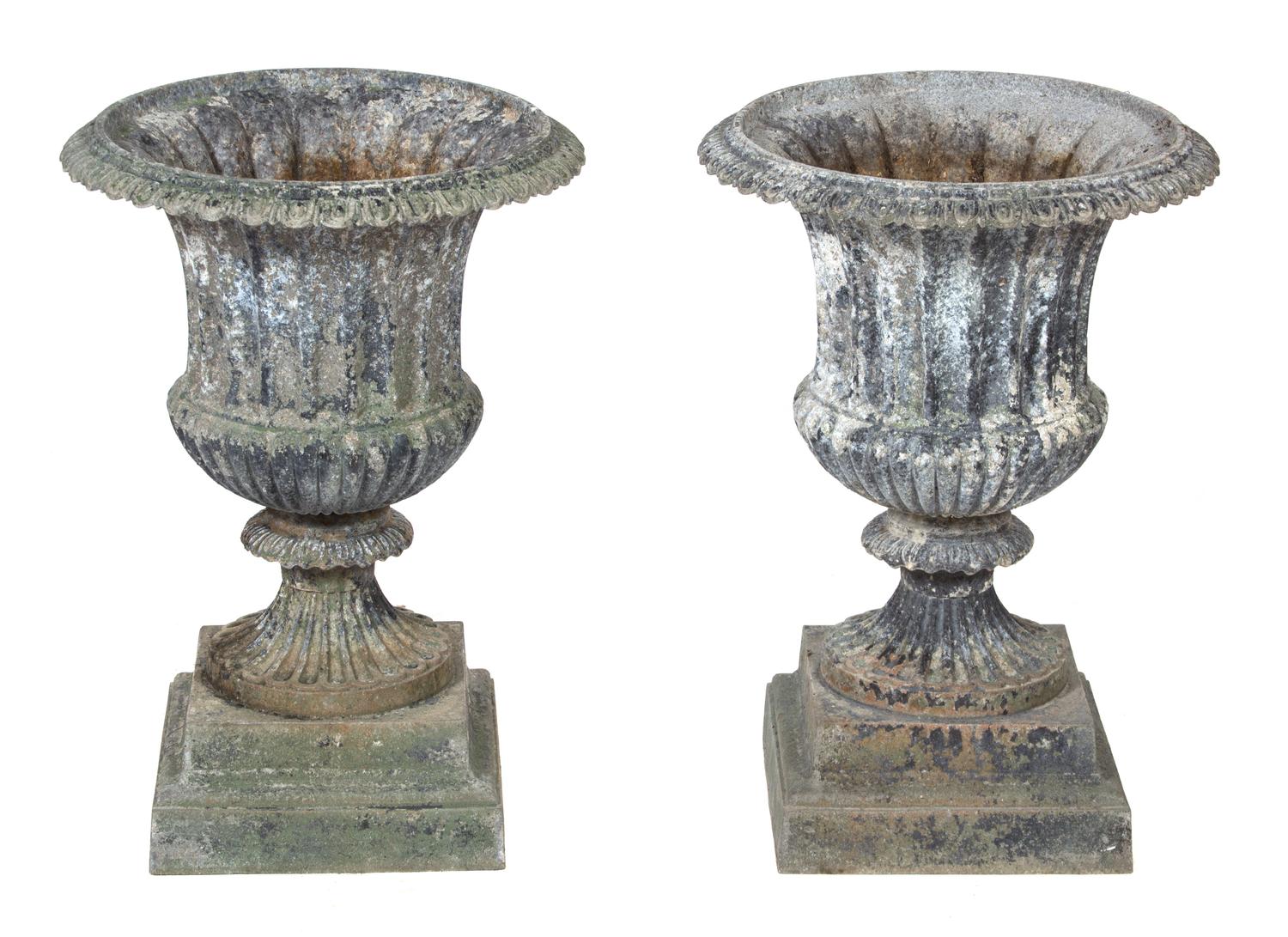 A Pair of Patinated Metal Campana Form Urns Height 24 x diameter 16 1/2 inches.