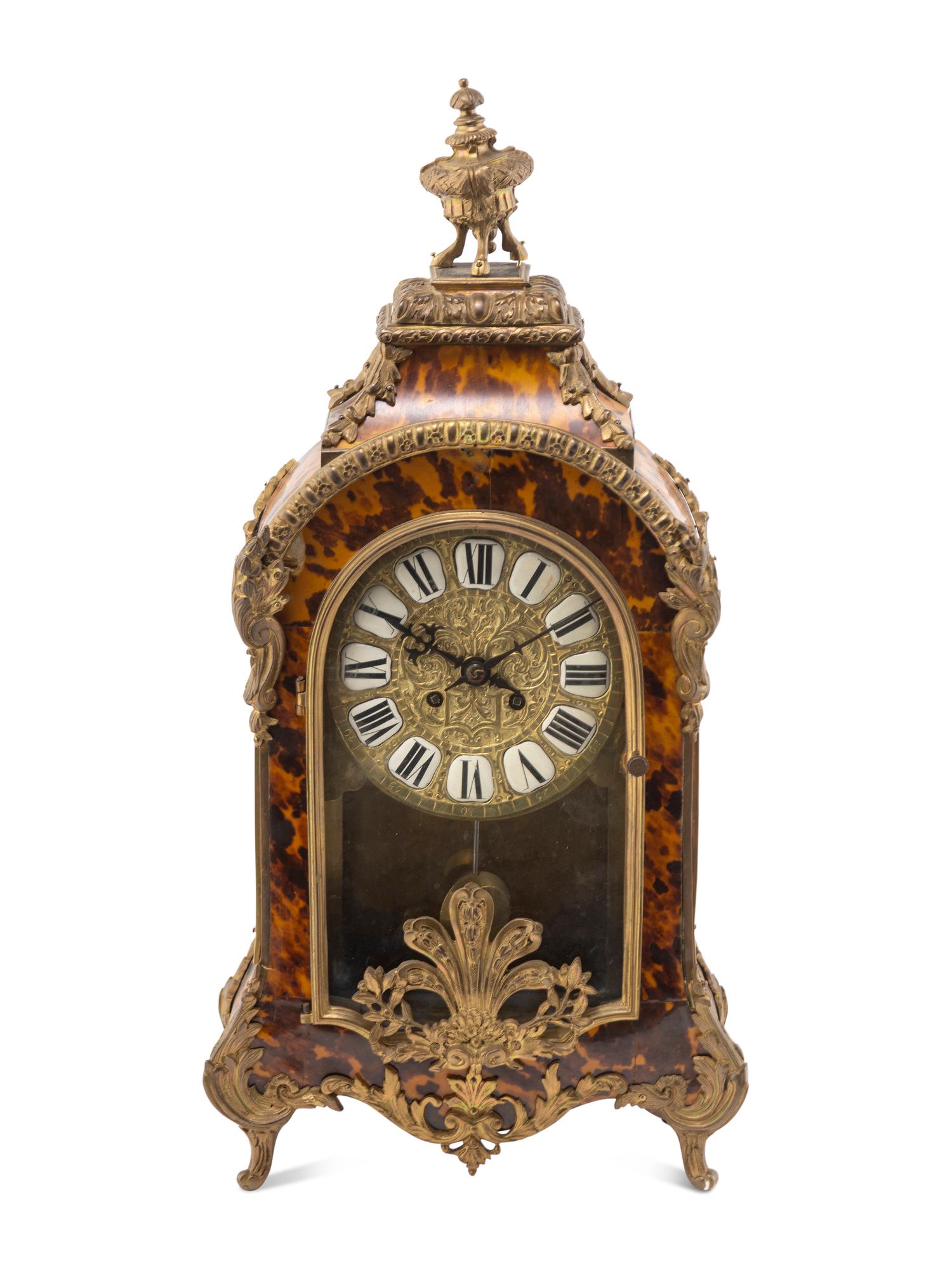 A Louis XV Style Tortoise Shell-Veneered Bracket Clock