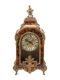 A Louis XV Style Tortoise Shell-Veneered Bracket Clock