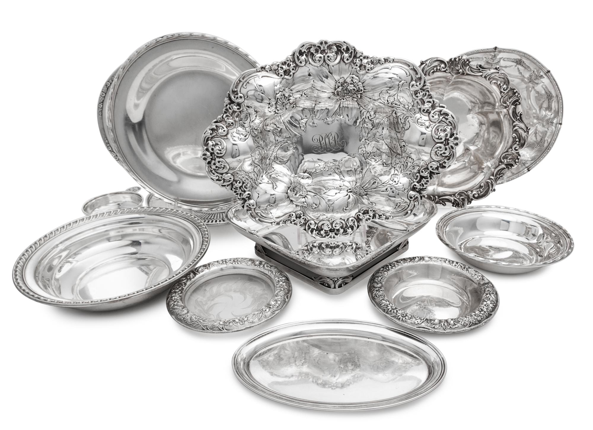 A Collection of American Silver Serving Articles, Various Makers, comprising a dish having repousse floral and foliate scroll decoratio