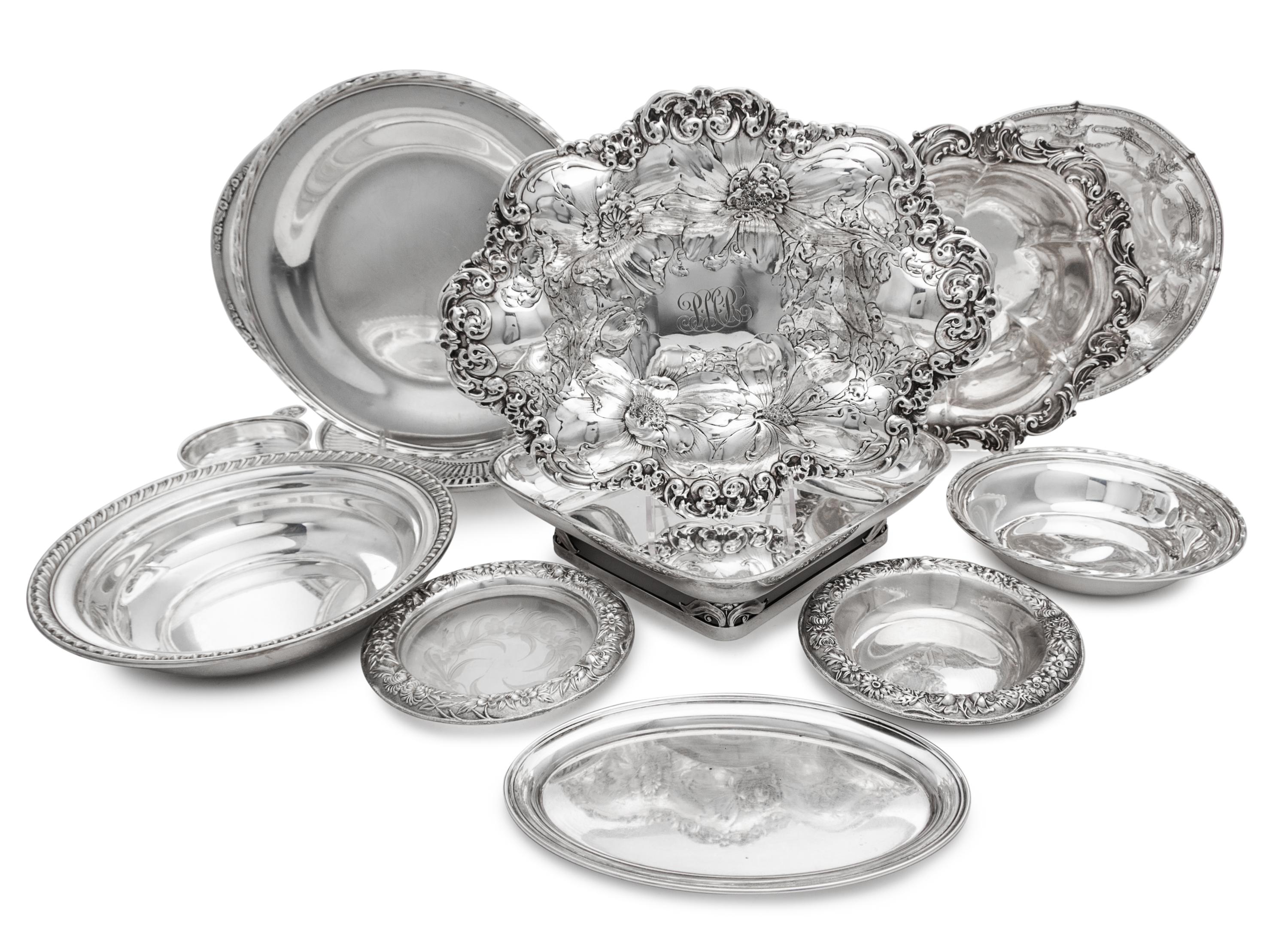 A Collection of American Silver Serving Articles, Various Makers, comprising a dish having repousse floral and foliate scroll decoratio