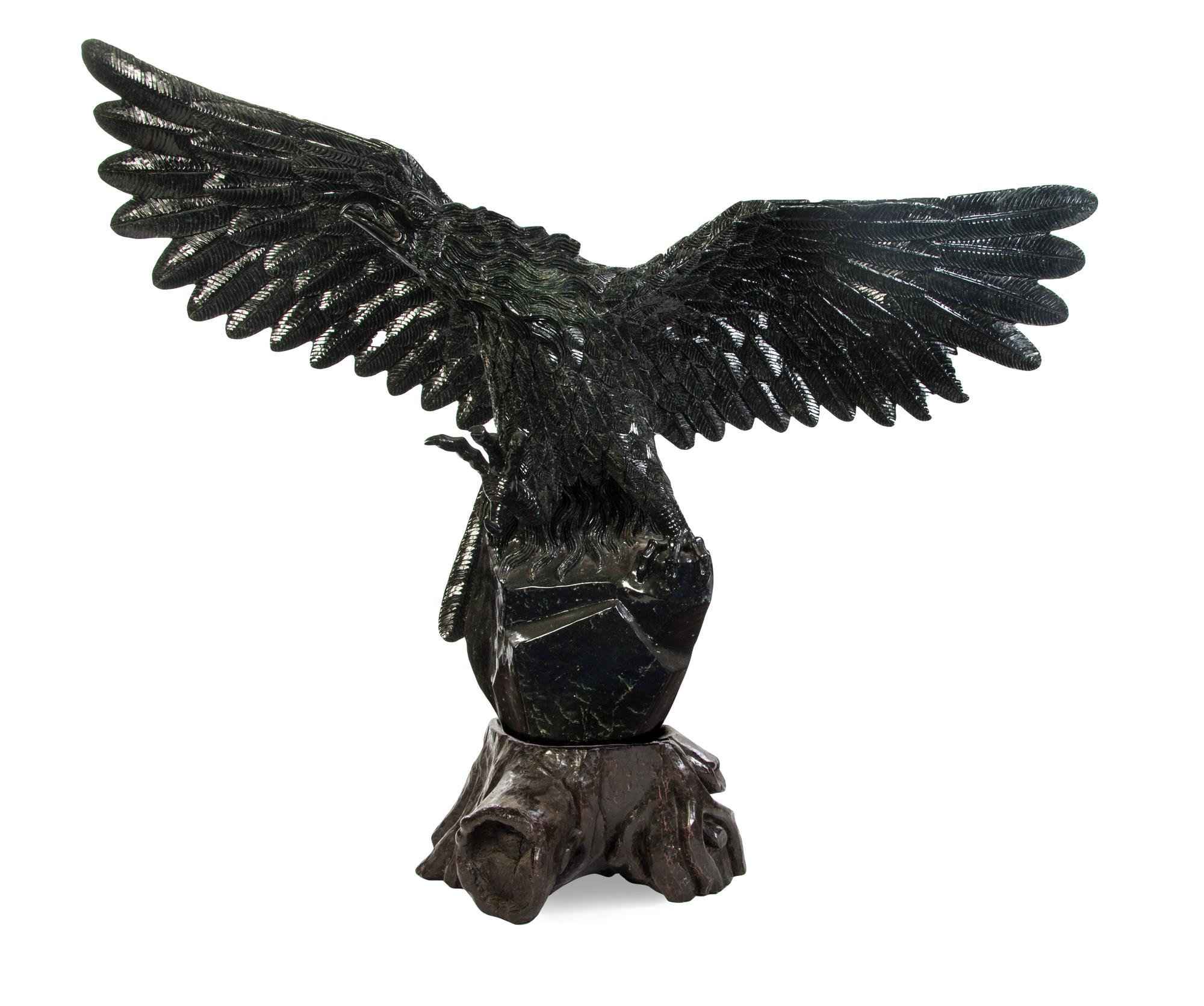 An American Carved Hardstone Model of an Eagle, Width over wings 58 inches.