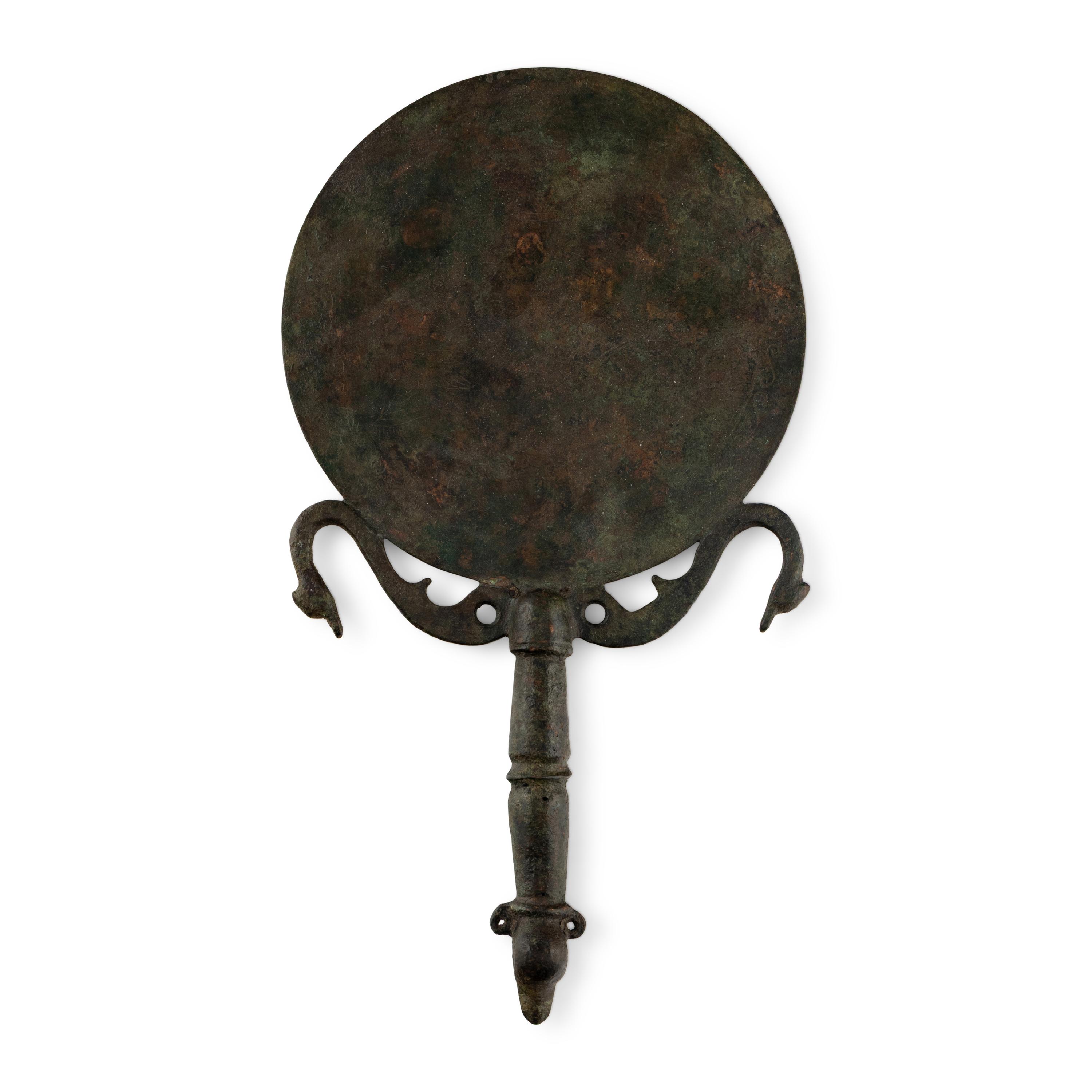 An Etruscan Style Bronze Mirror