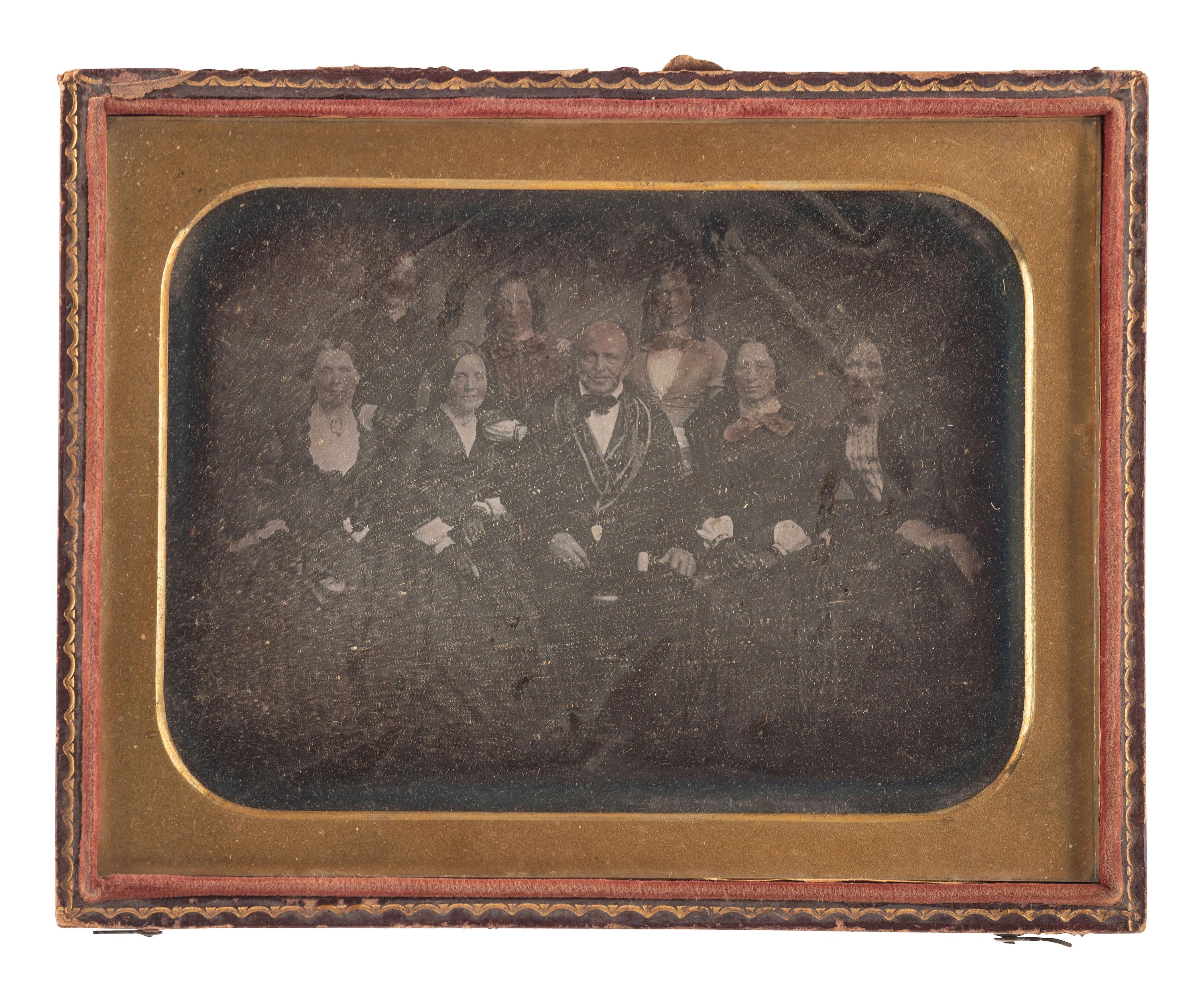 [EARLY PHOTOGRAPHY]. A pair of half plate daguerreotypes, highlighted by large group portrait by T.M. Parker, comprising:
