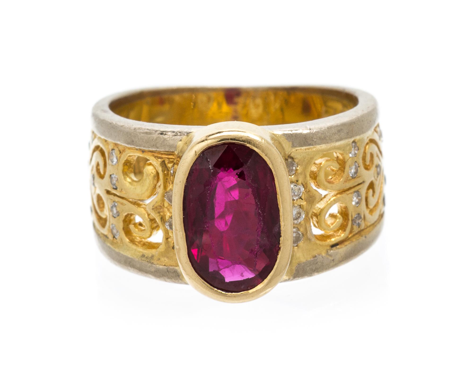 An 18 Karat Yellow Gold, Ruby and Diamond Ring, 3.60 dwts.