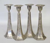 Two pair of sterling silver weighted candlesticks 20th century
