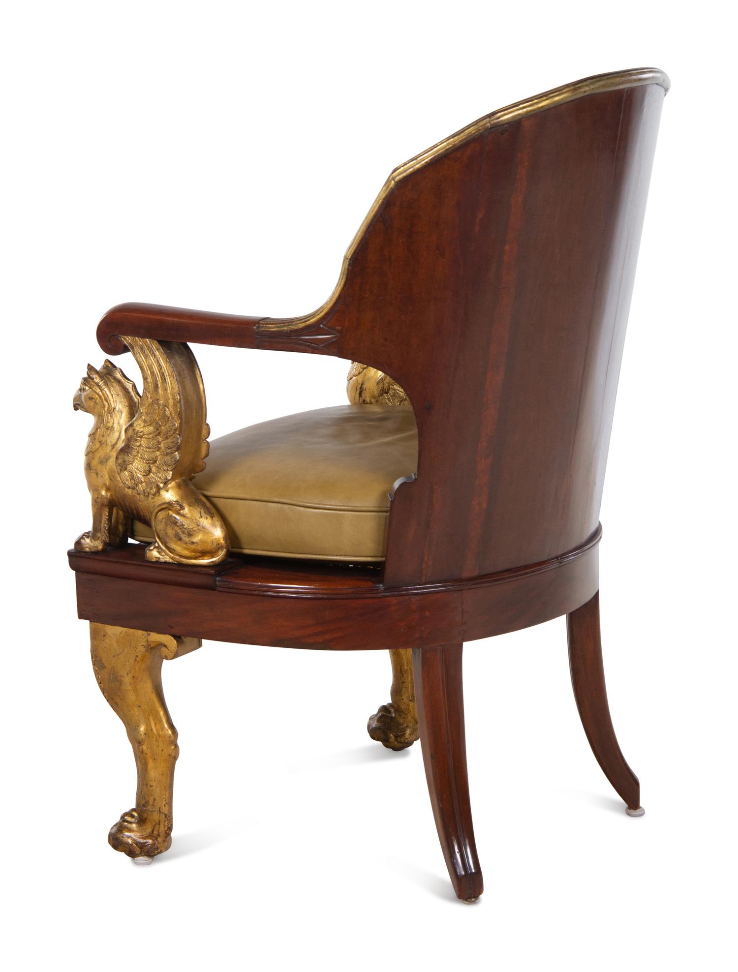 An Empire Parcel Gilt Mahogany Fauteuil